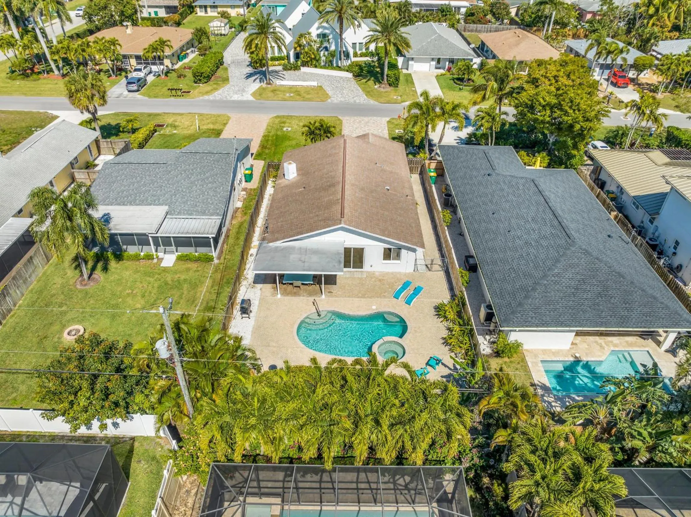 Relax Poolside & Walk or Bike to the Beach From This Amazing Naples Pool Home!
