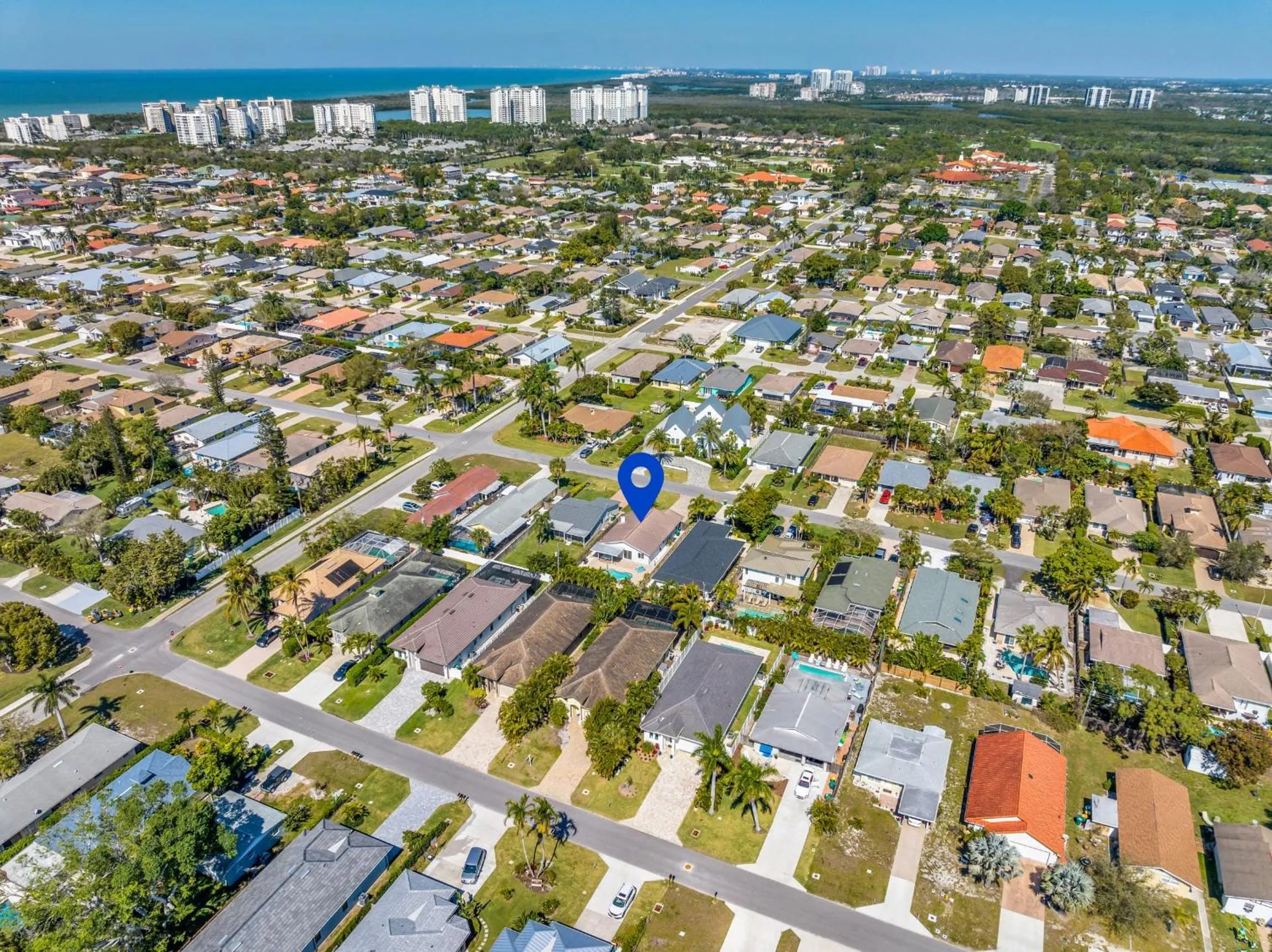 Relax Poolside & Walk or Bike to the Beach From This Amazing Naples Pool Home!