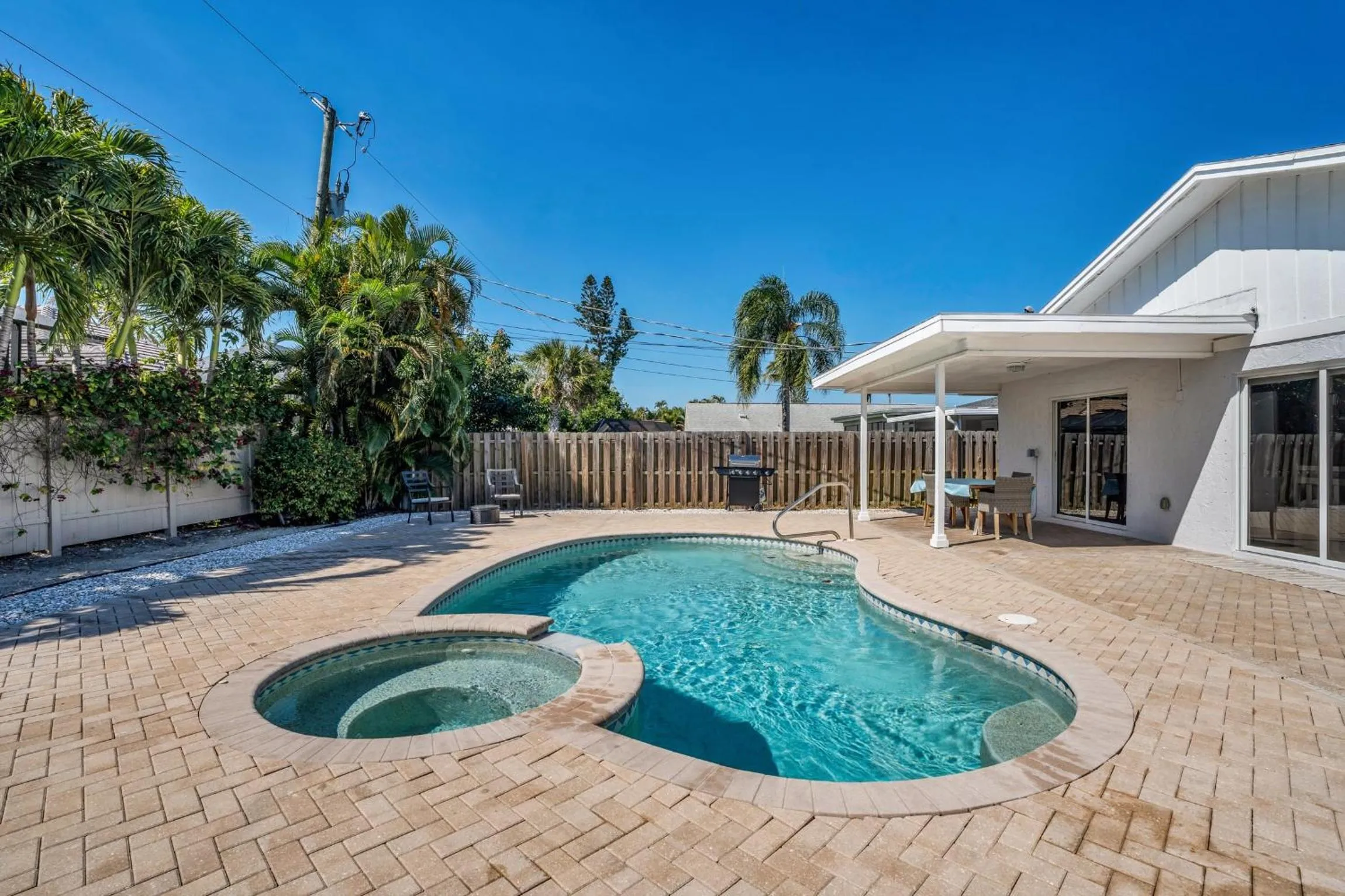 Relax Poolside & Walk or Bike to the Beach From This Amazing Naples Pool Home!