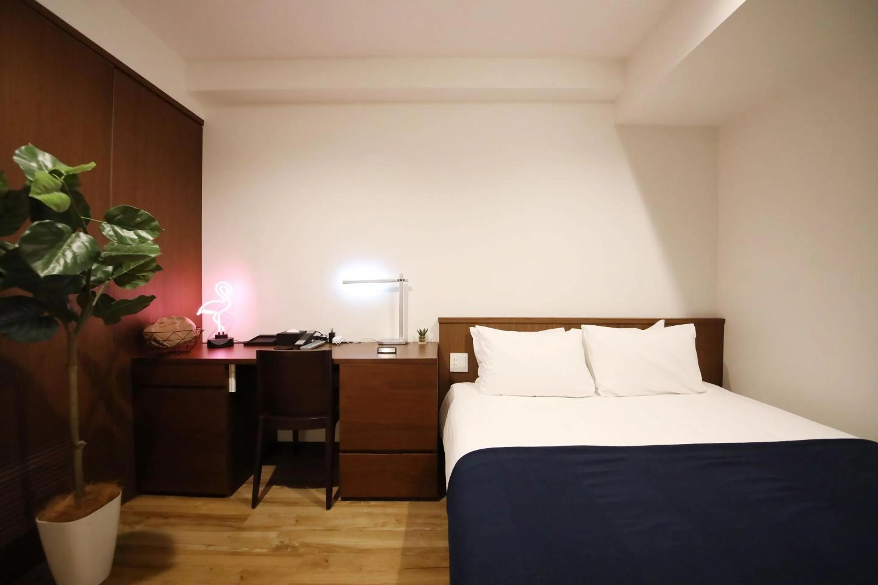 Bed in ZONK HOTEL Hakata