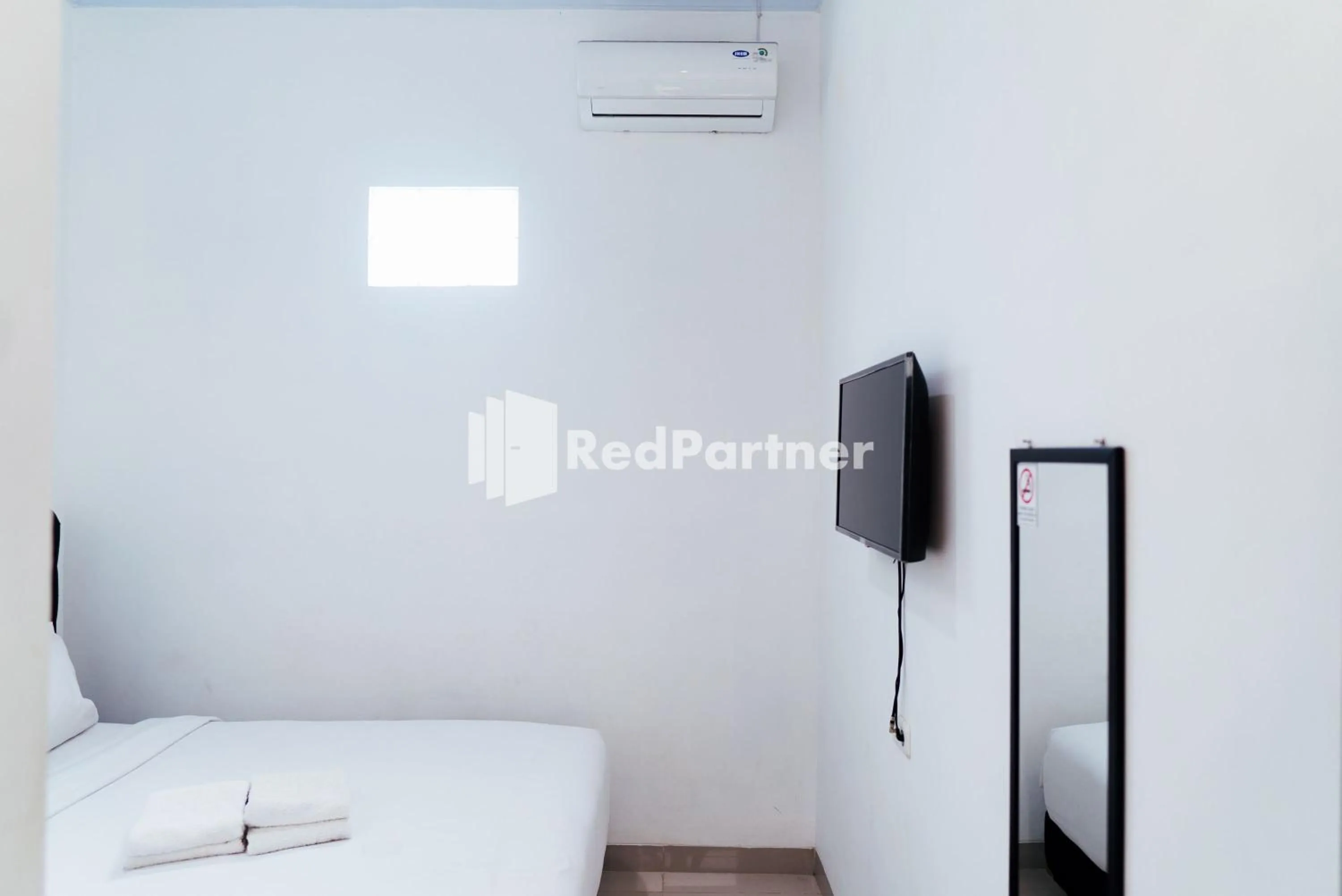 Bedroom in Aksara Homestay Syariah Mitra RedDoorz