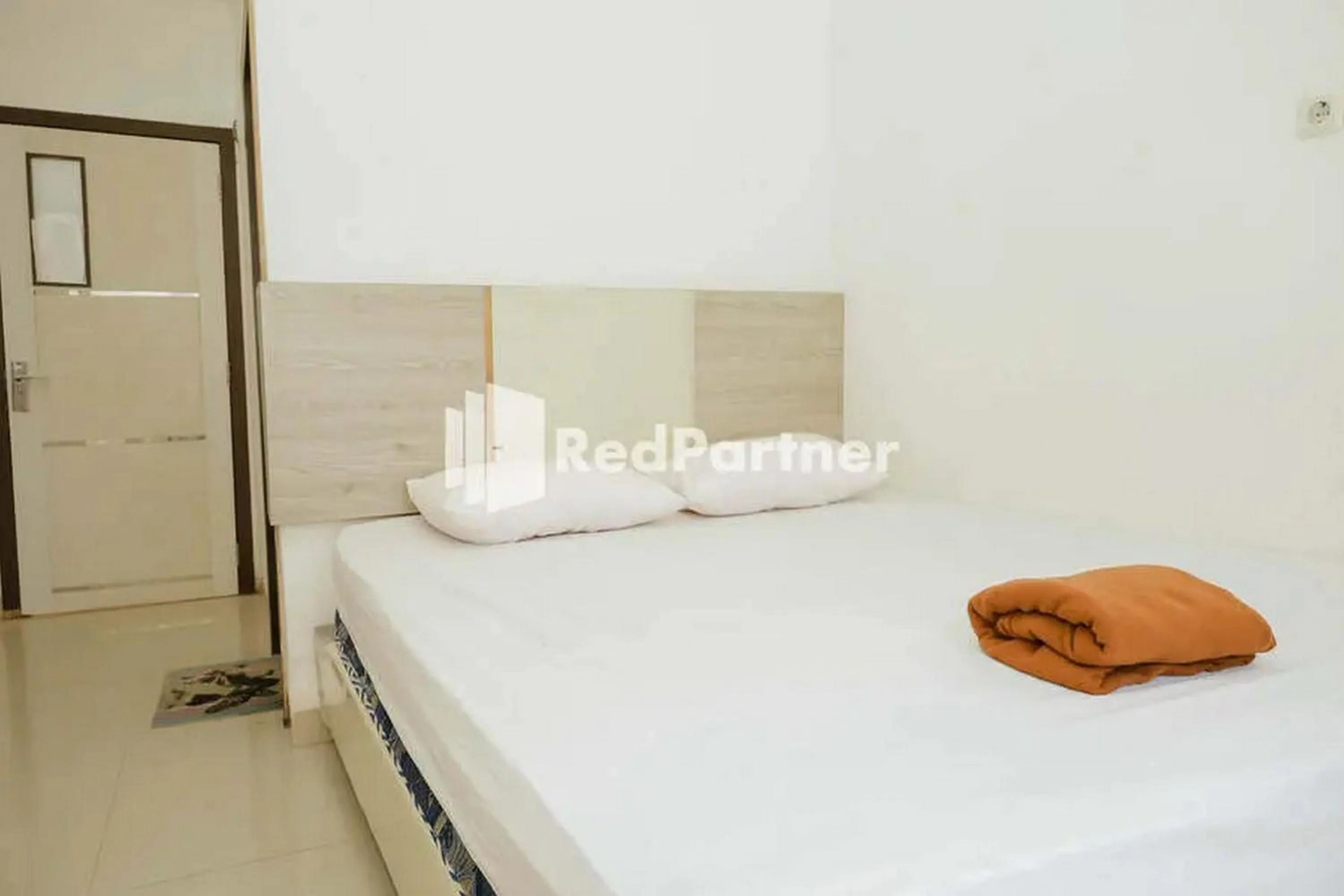 Bedroom, Bed in Radja Homestay Kendari RedPartner
