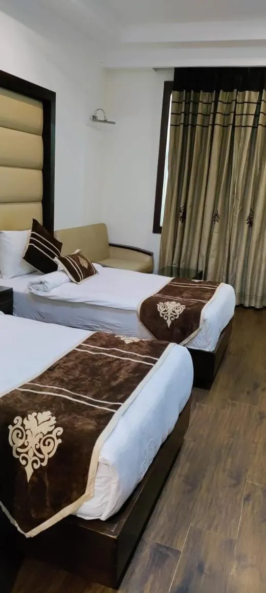 Bedroom, Bed in HOTEL PITRASHISH PRIDE IGI Intl AIRPORT DELHI