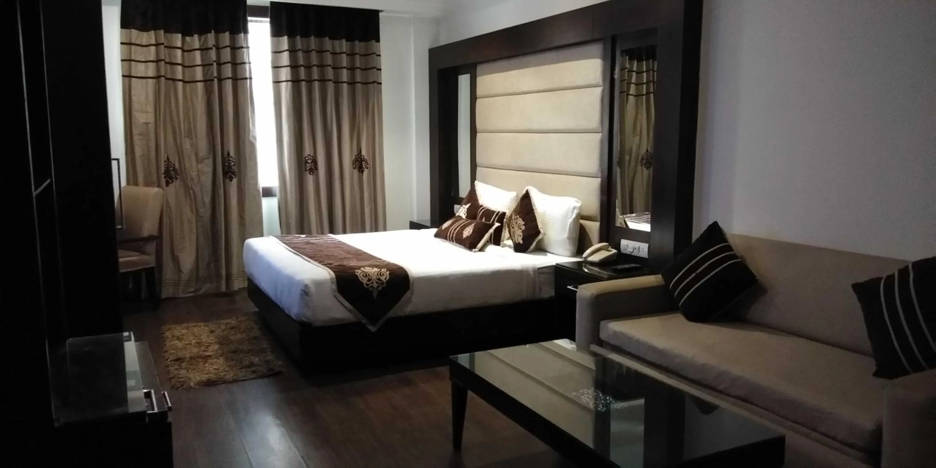 Bedroom, Bed in HOTEL PITRASHISH PRIDE IGI Intl AIRPORT DELHI