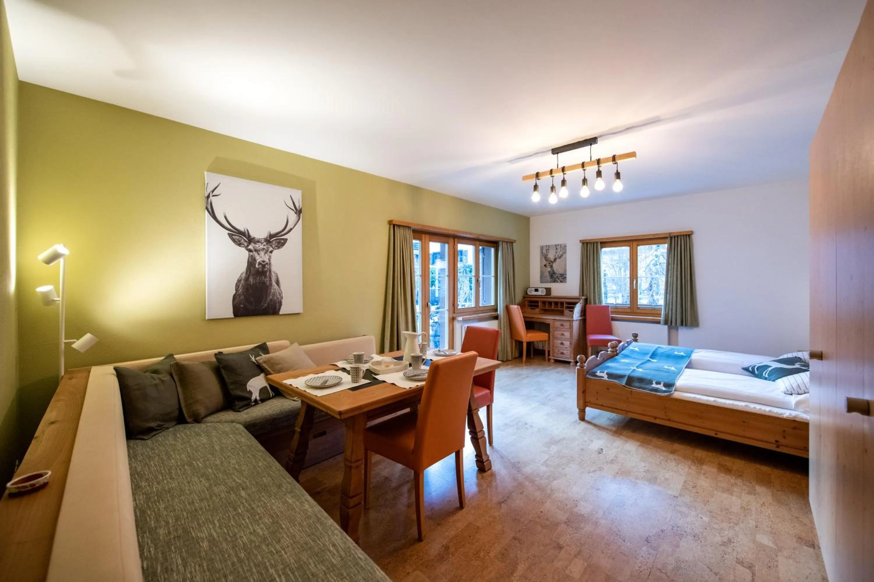 Living room, Bed in Sport-Lodge Klosters