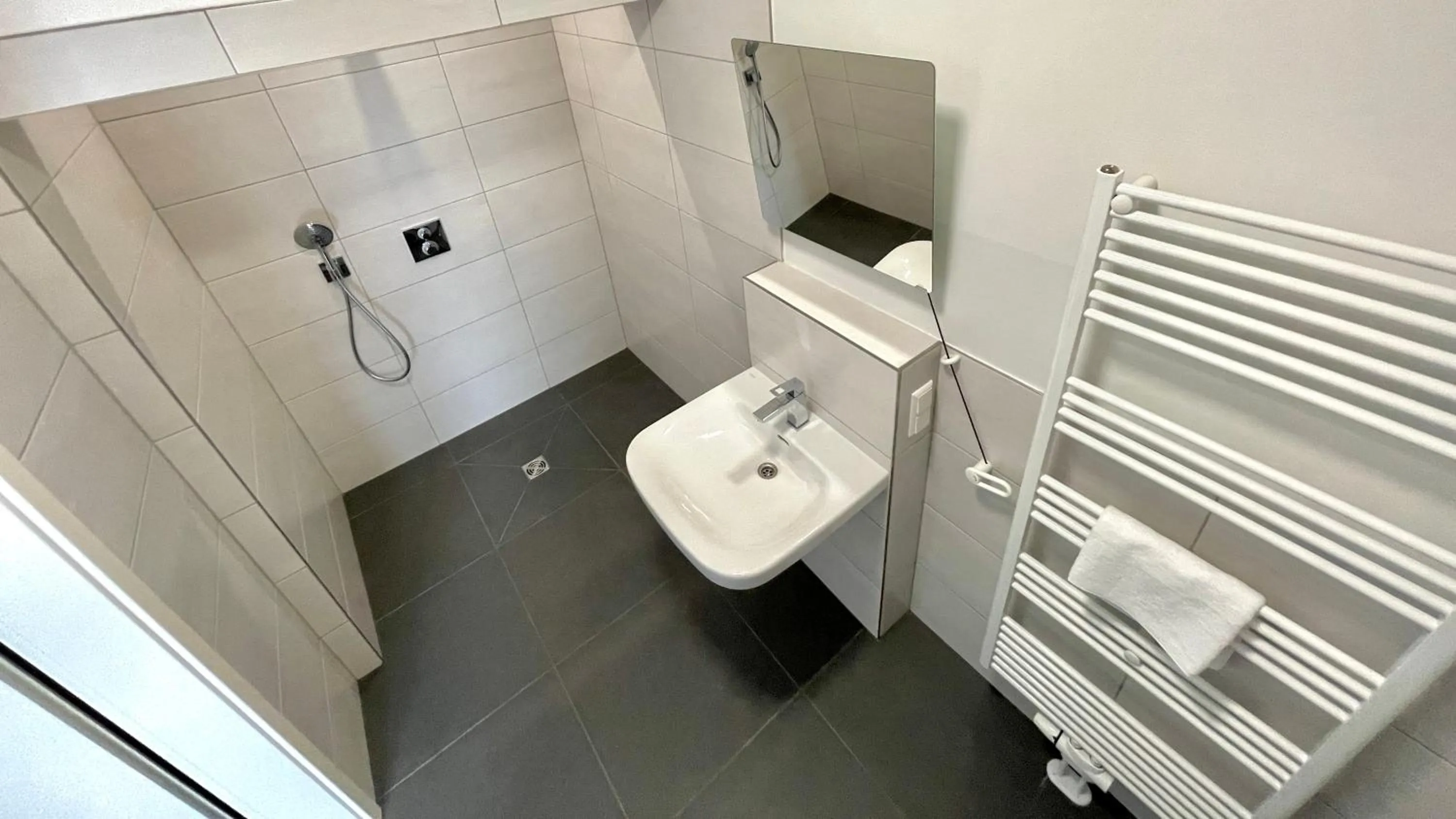 Bathroom in IQ Hotel Hannover