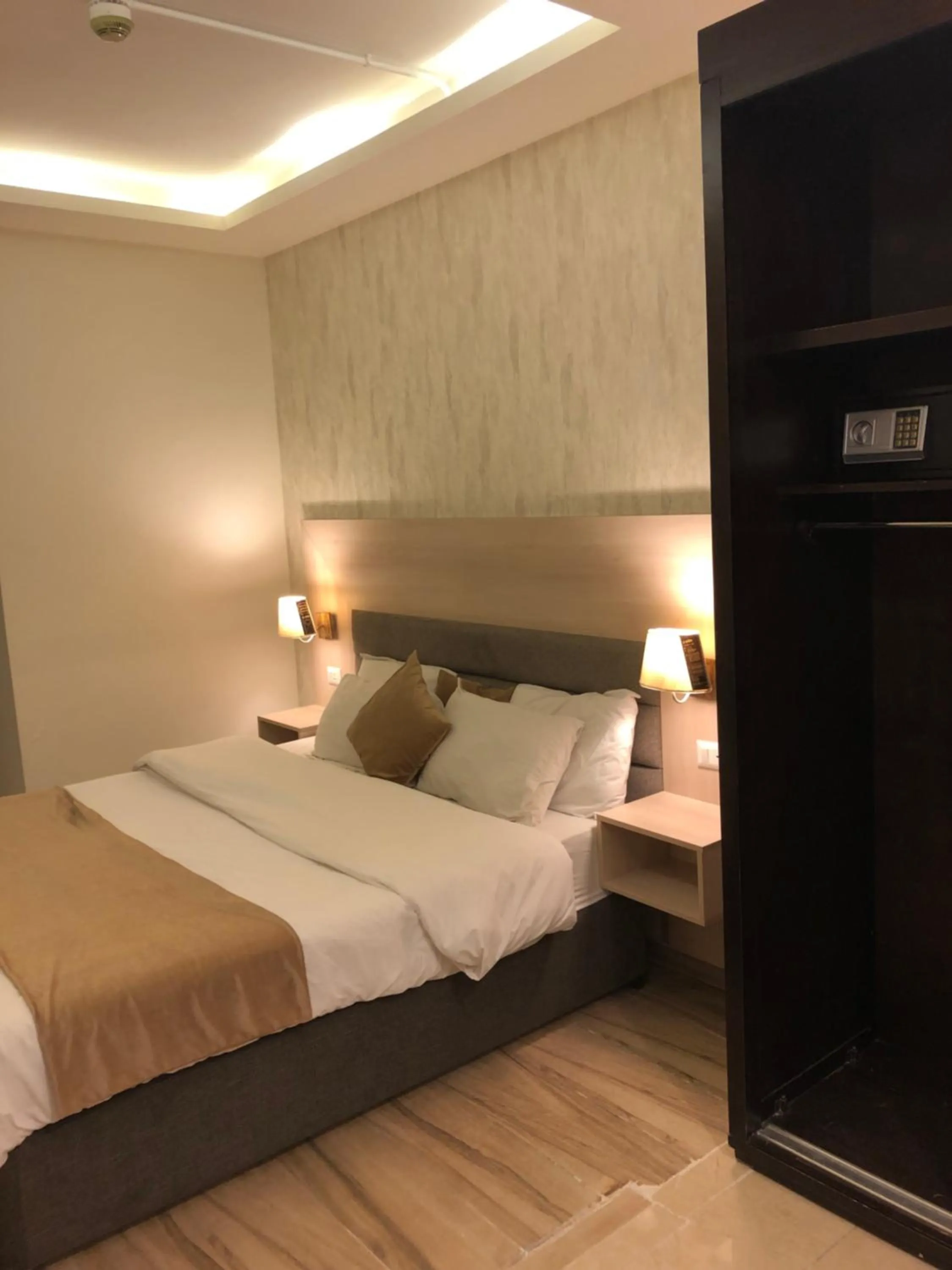 Bed in AlQimah Hotel Apartments