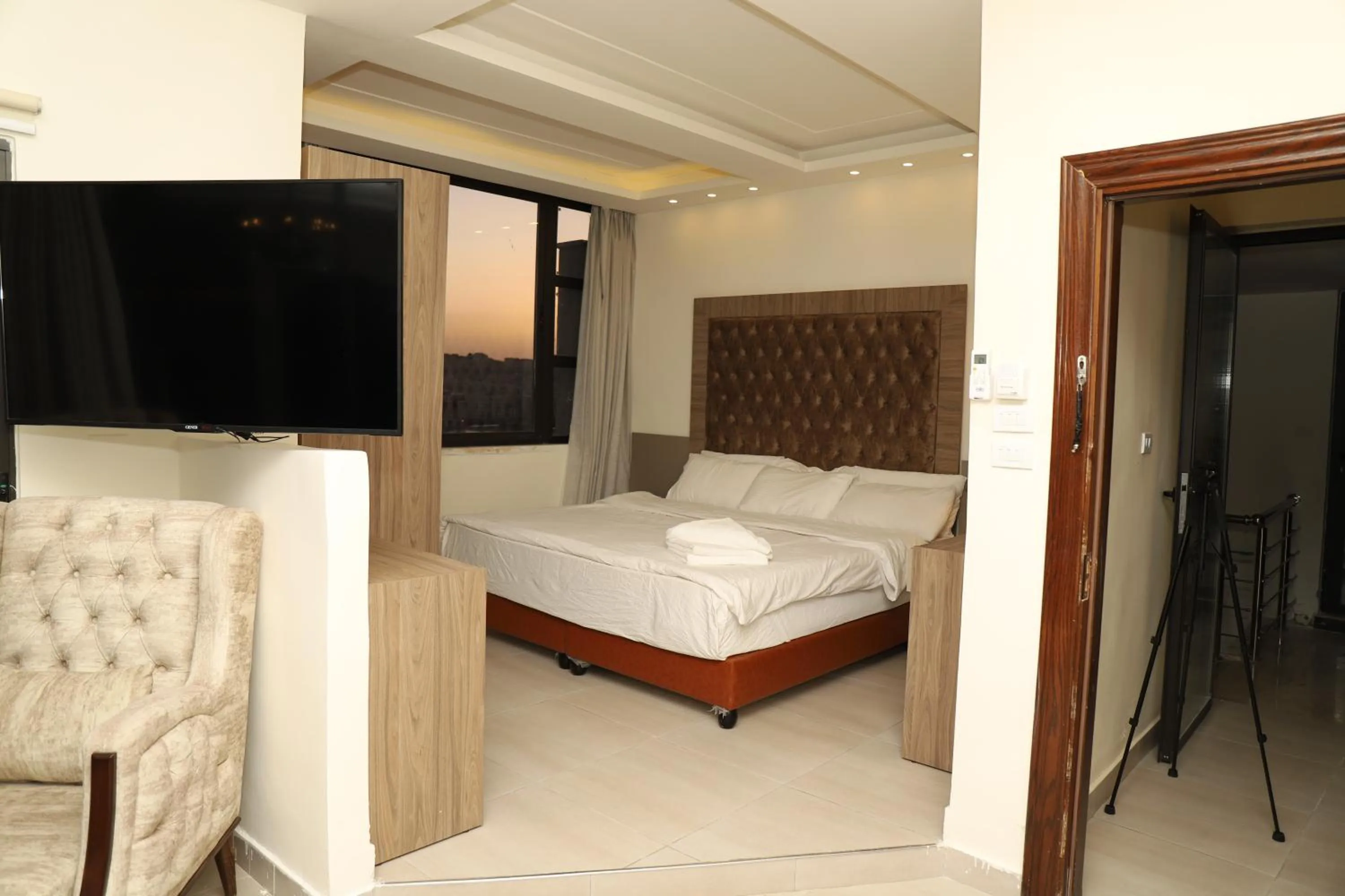Bed in AlQimah Hotel Apartments