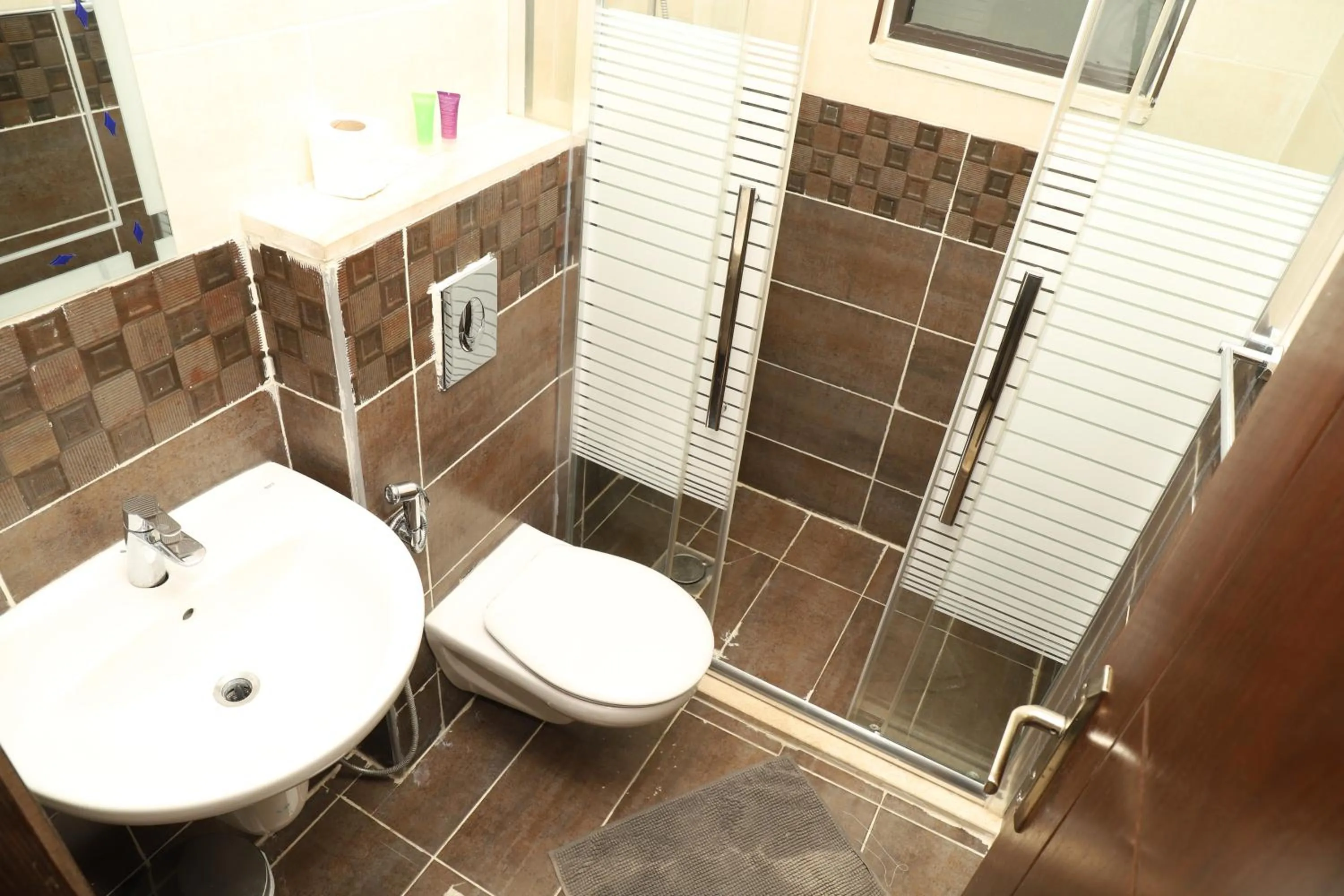 Bathroom in AlQimah Hotel Apartments