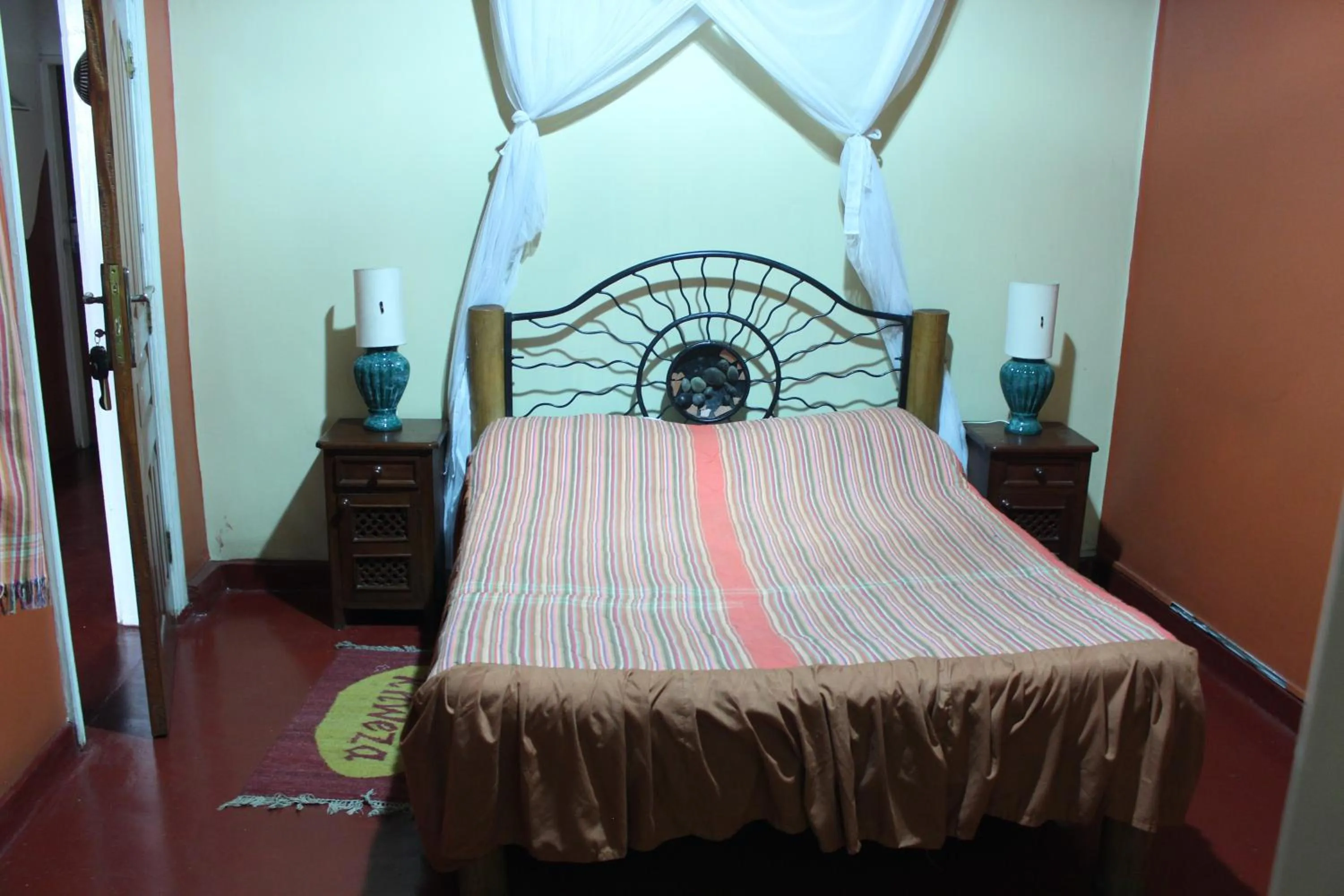 Bed in Khweza Bed and Breakfast