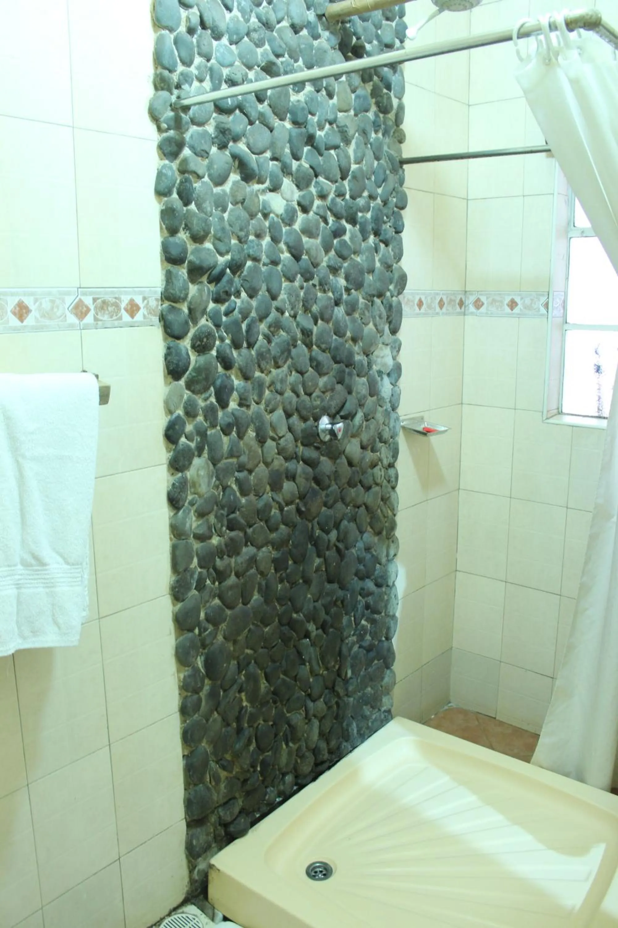 Shower in Khweza Bed and Breakfast