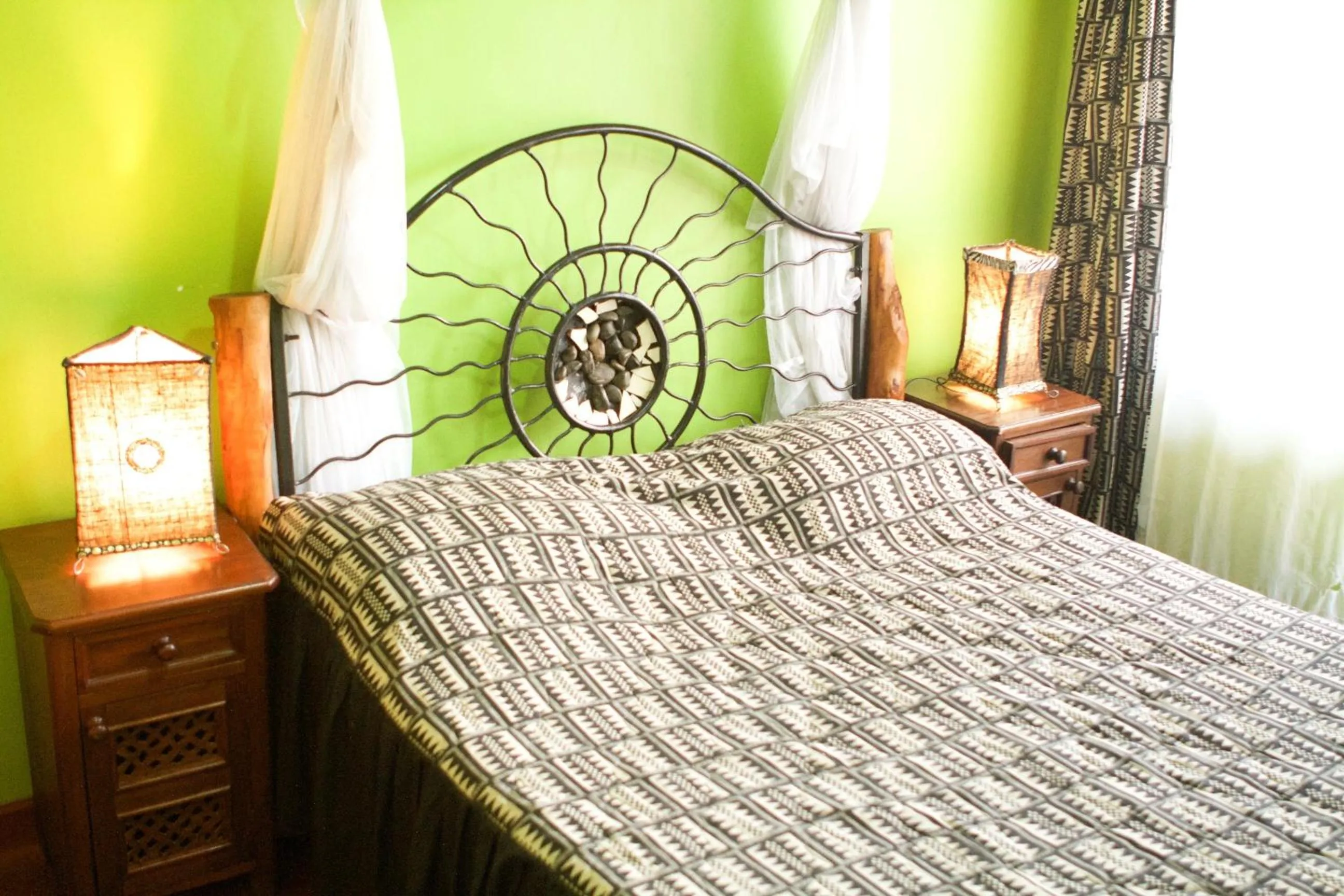 Decorative detail, Bed in Khweza Bed and Breakfast