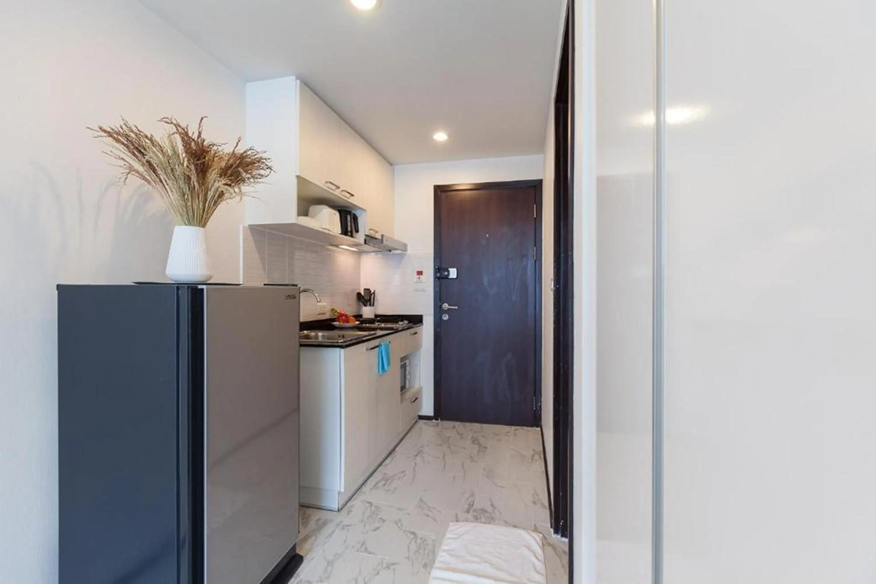 Kitchen or kitchenette in The Title Beach Front