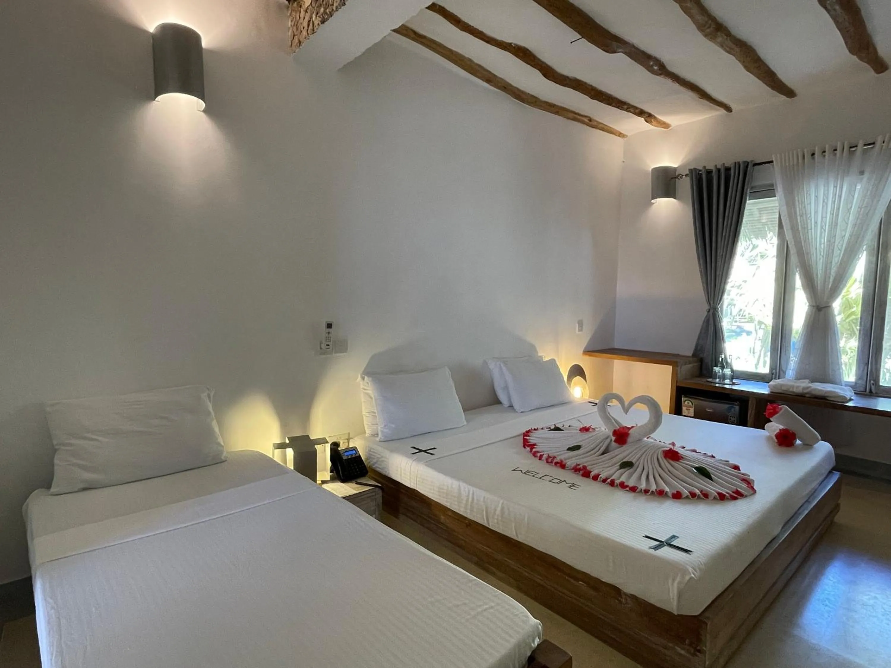 Bed in Mawe Zuri Resort