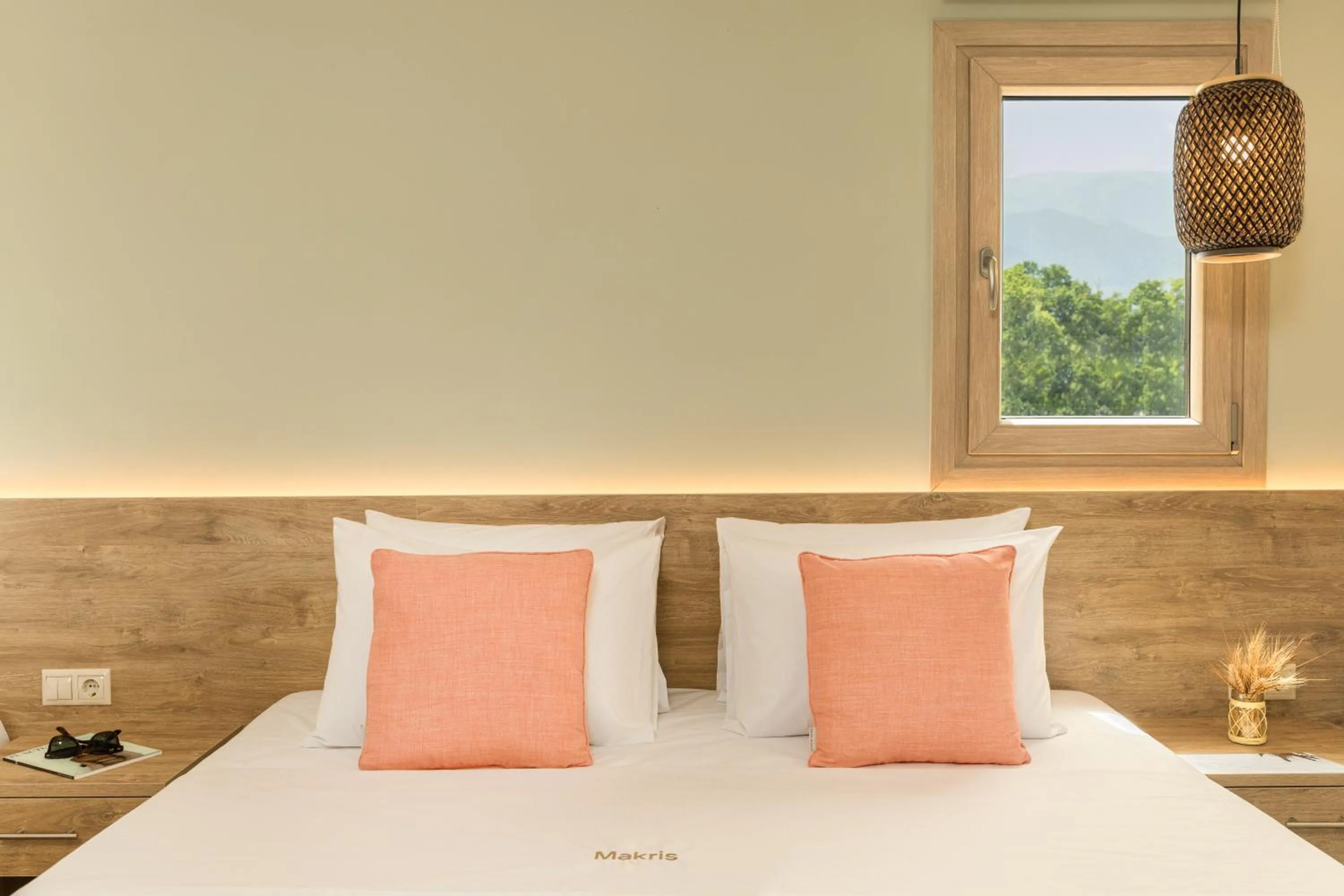 Bed in Makris Luxury Rooms