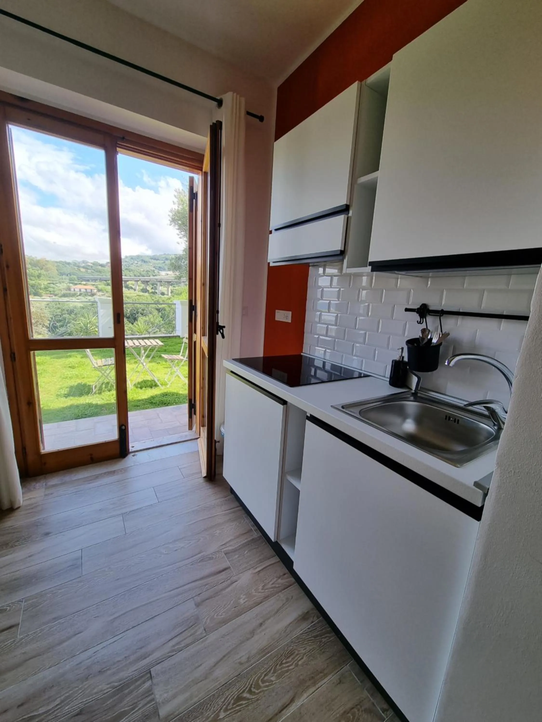Communal kitchen in Talìa Residence