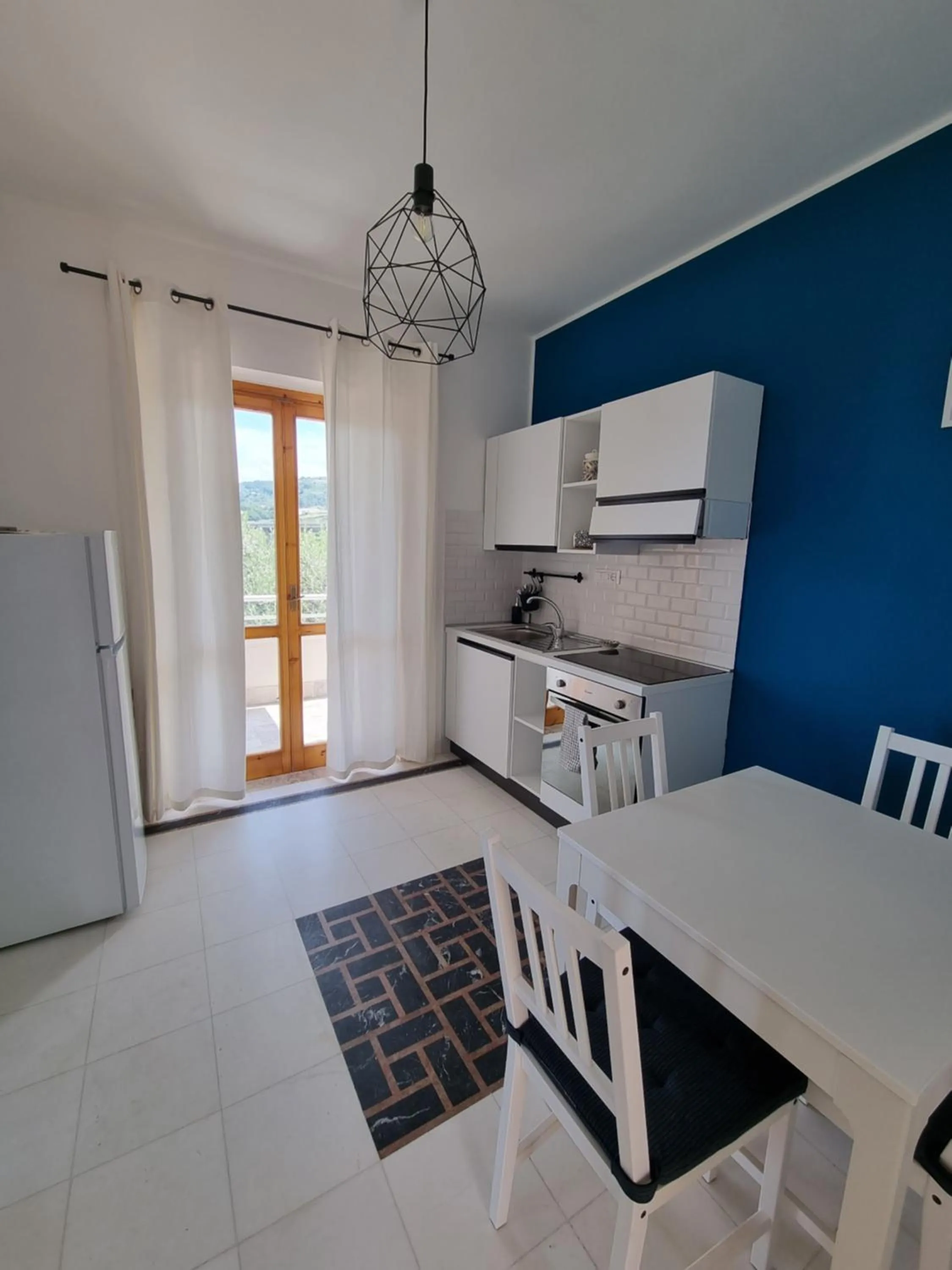 Kitchen or kitchenette in Talìa Residence