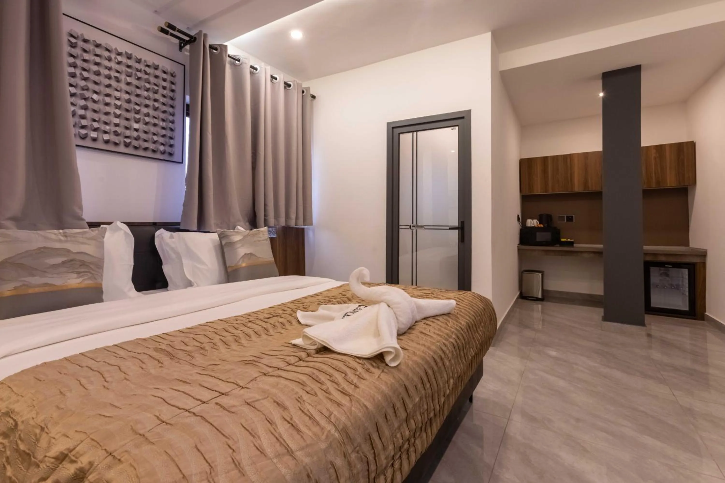 Bed in The Cabyn Boutique Hotel