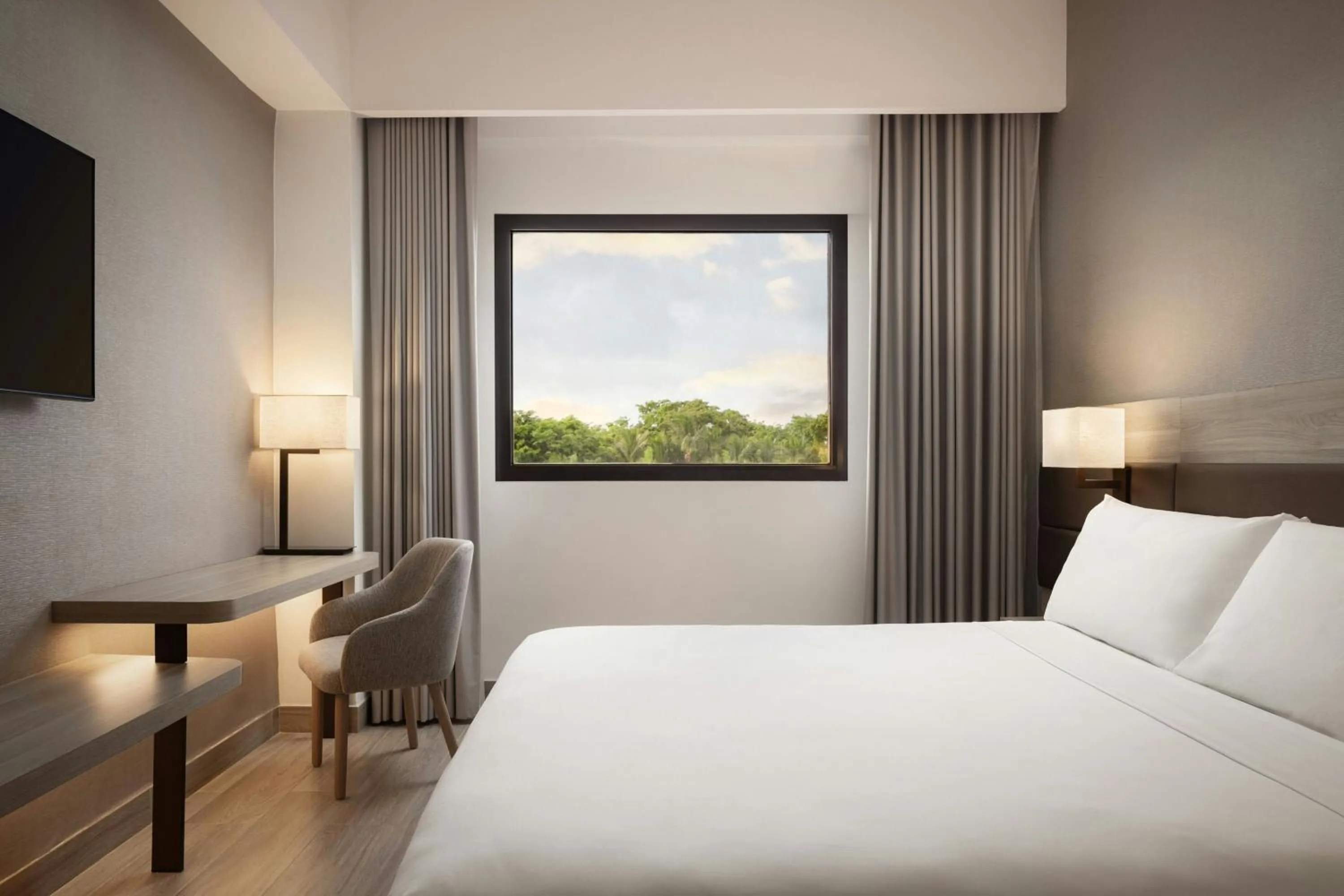 Photo of the whole room, Bed in AC Hotel by Marriott Punta Cana