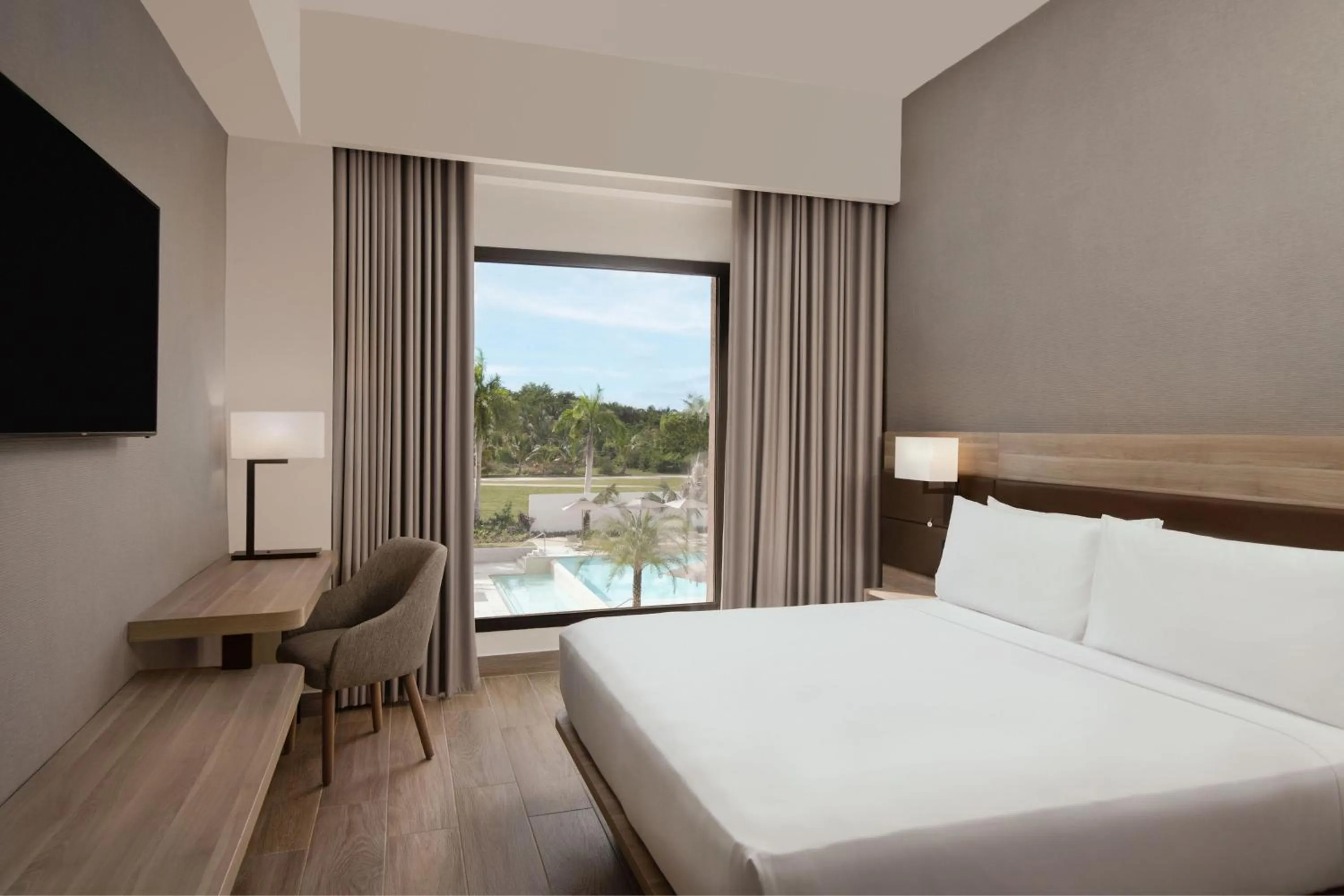 Photo of the whole room, Bed in AC Hotel by Marriott Punta Cana