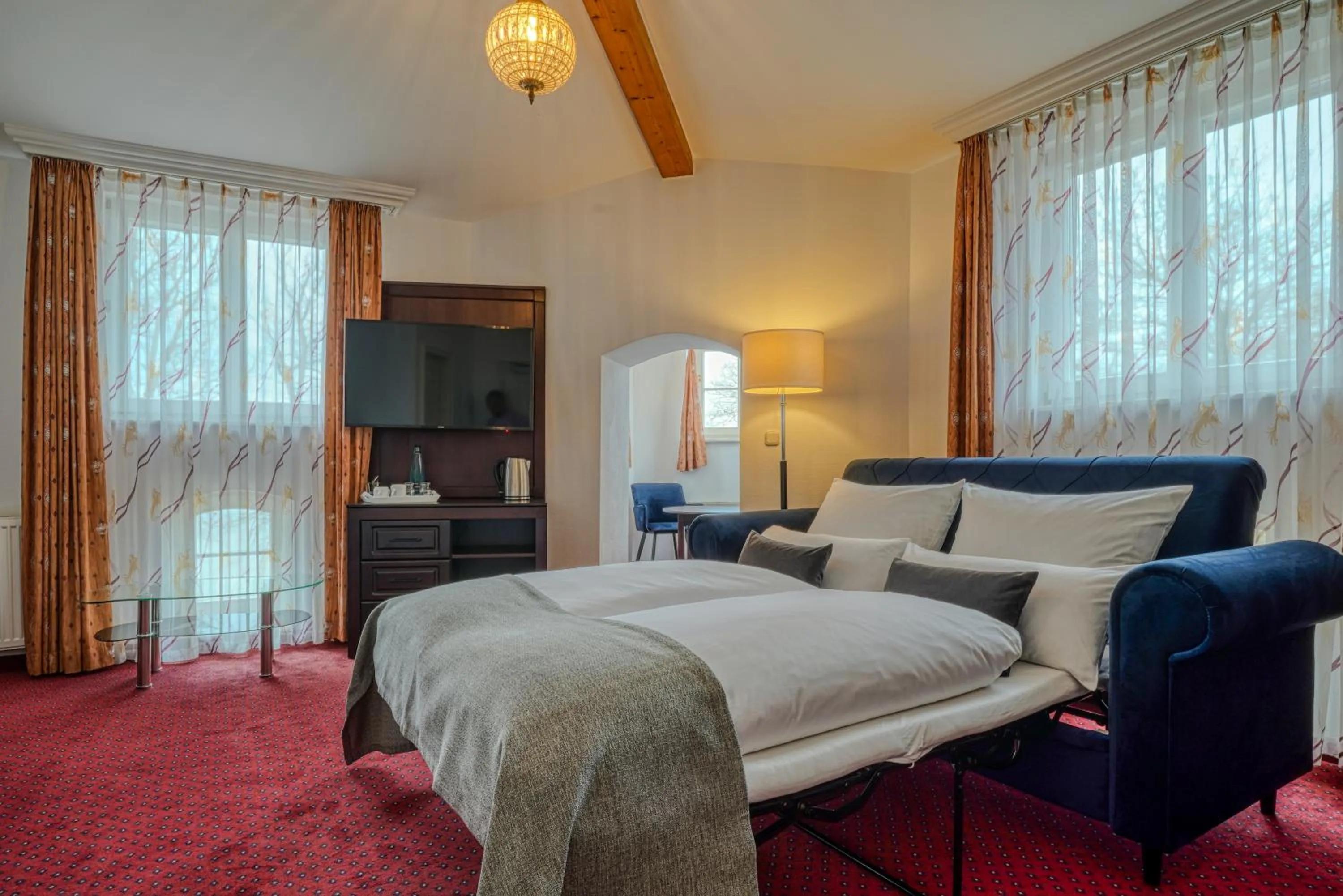 Living room, Bed in Hotel Seeblick Wismar