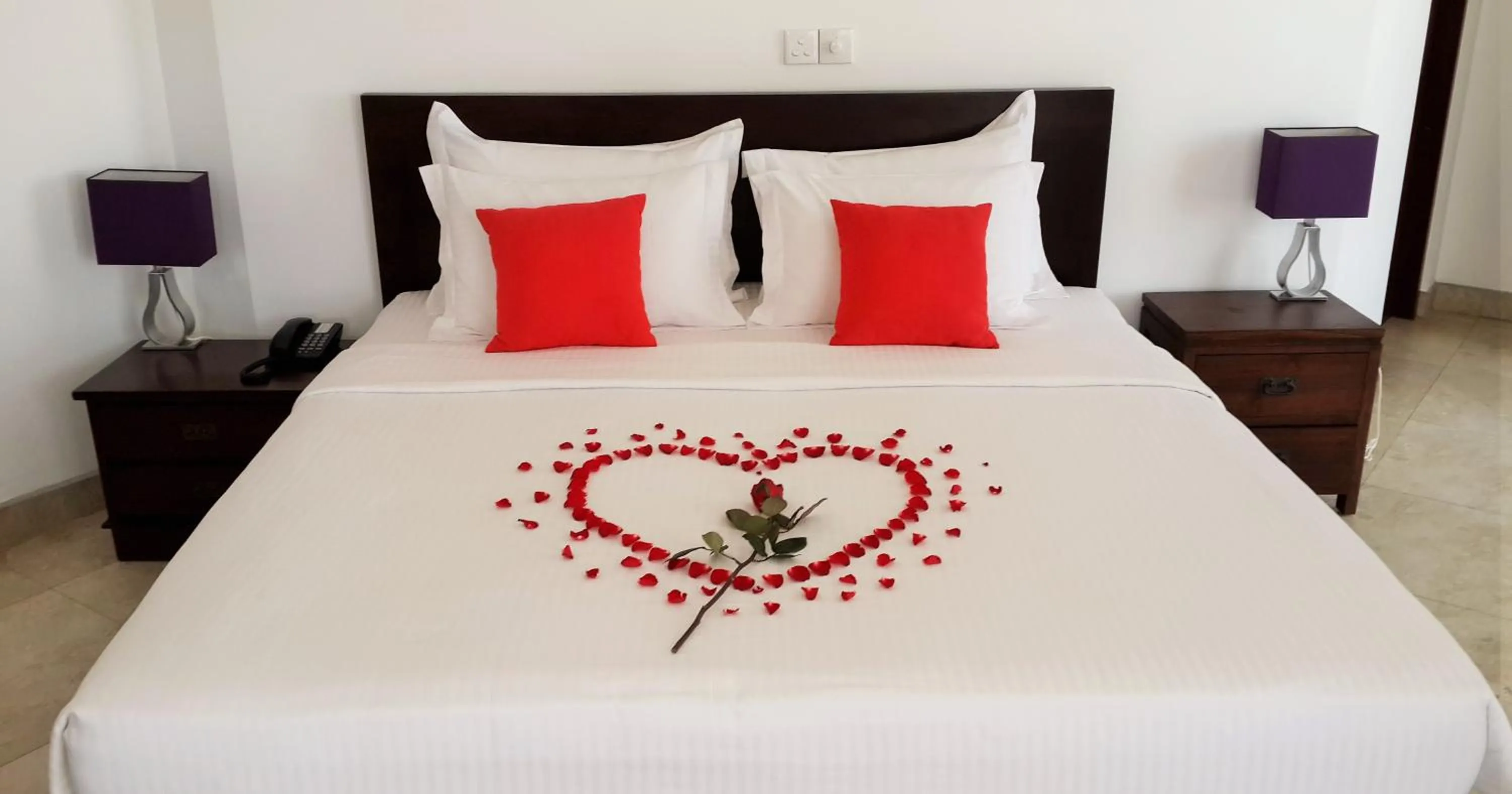 Decorative detail, Bed in IMAGINE Villa Hotel