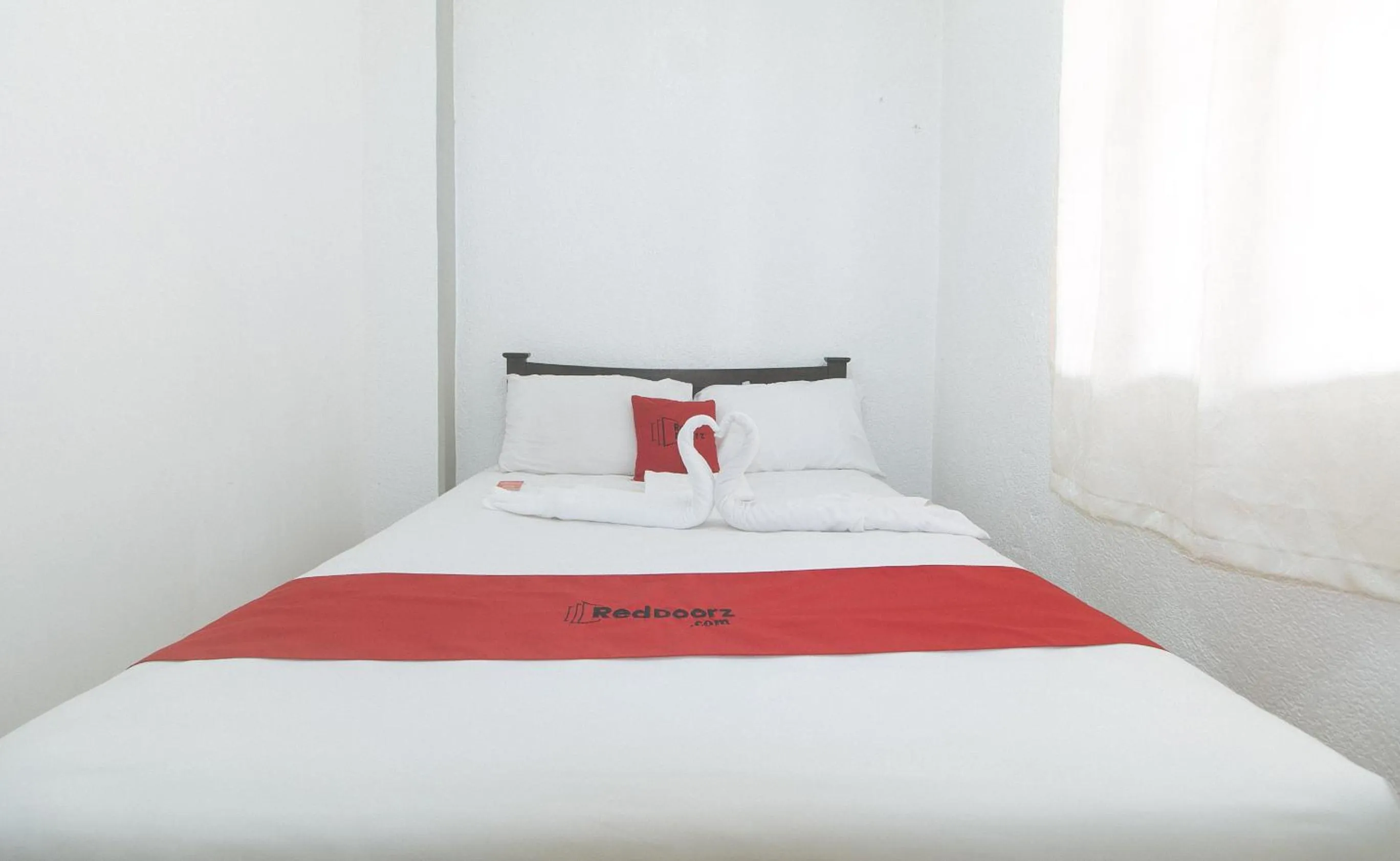 Bedroom, Bed in RedDoorz Plus near Tambo Paranaque