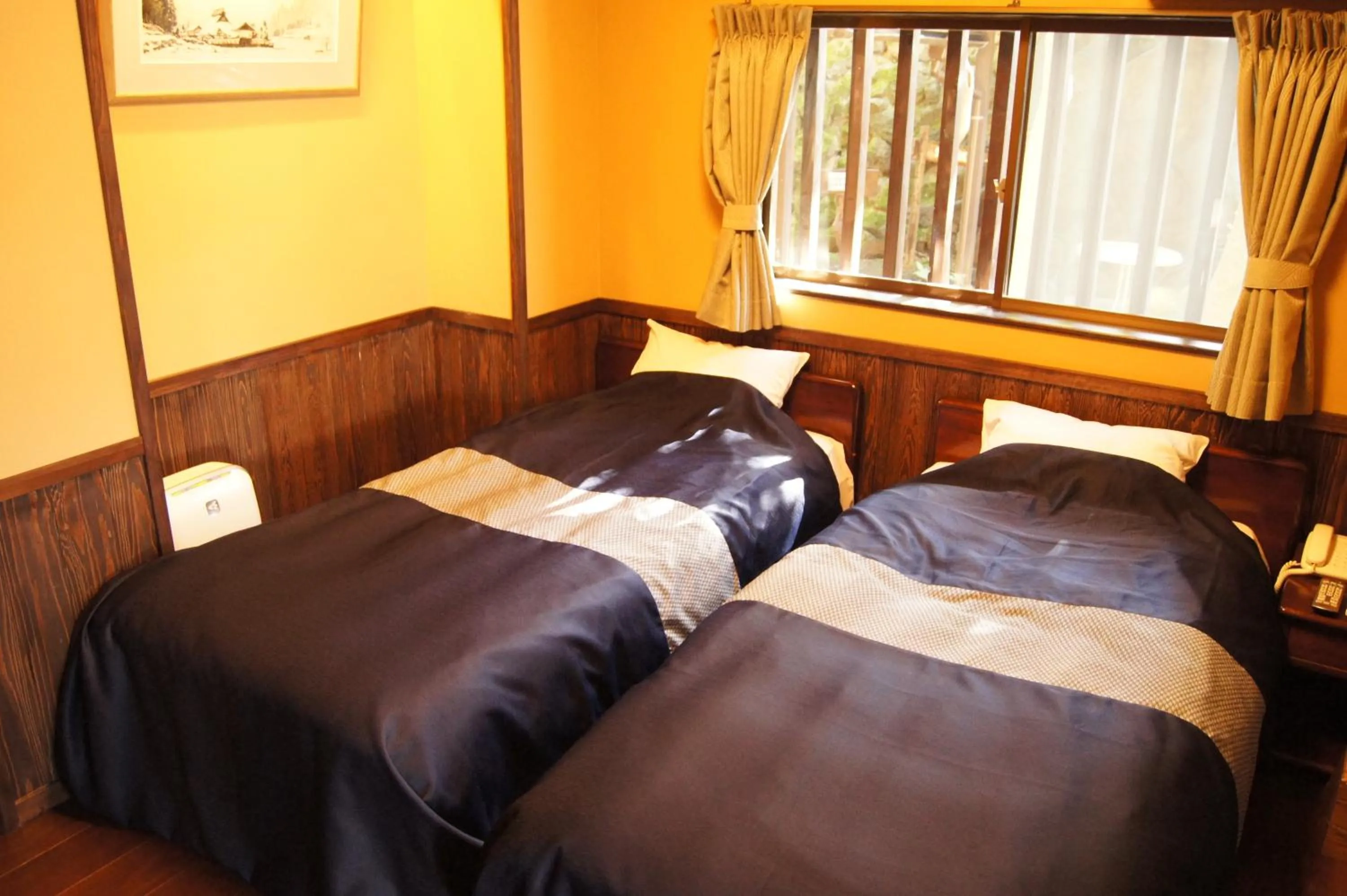 Bed in Fumoto Ryokan