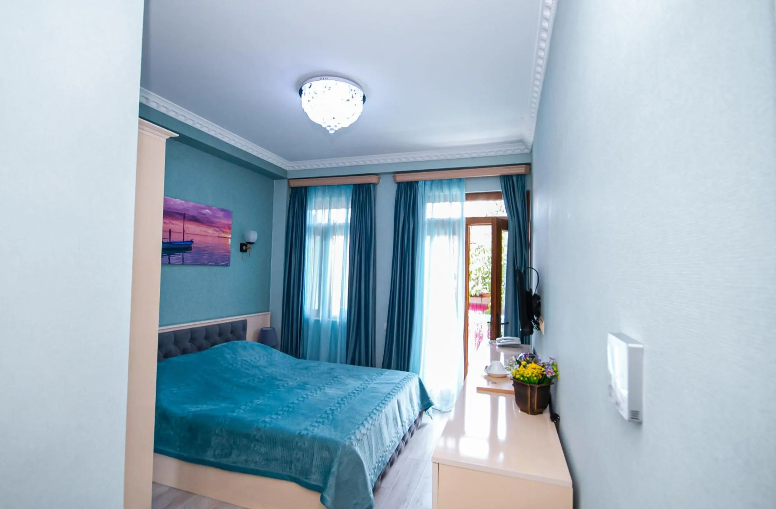 Bed in MUSMORE Boutique Hotel