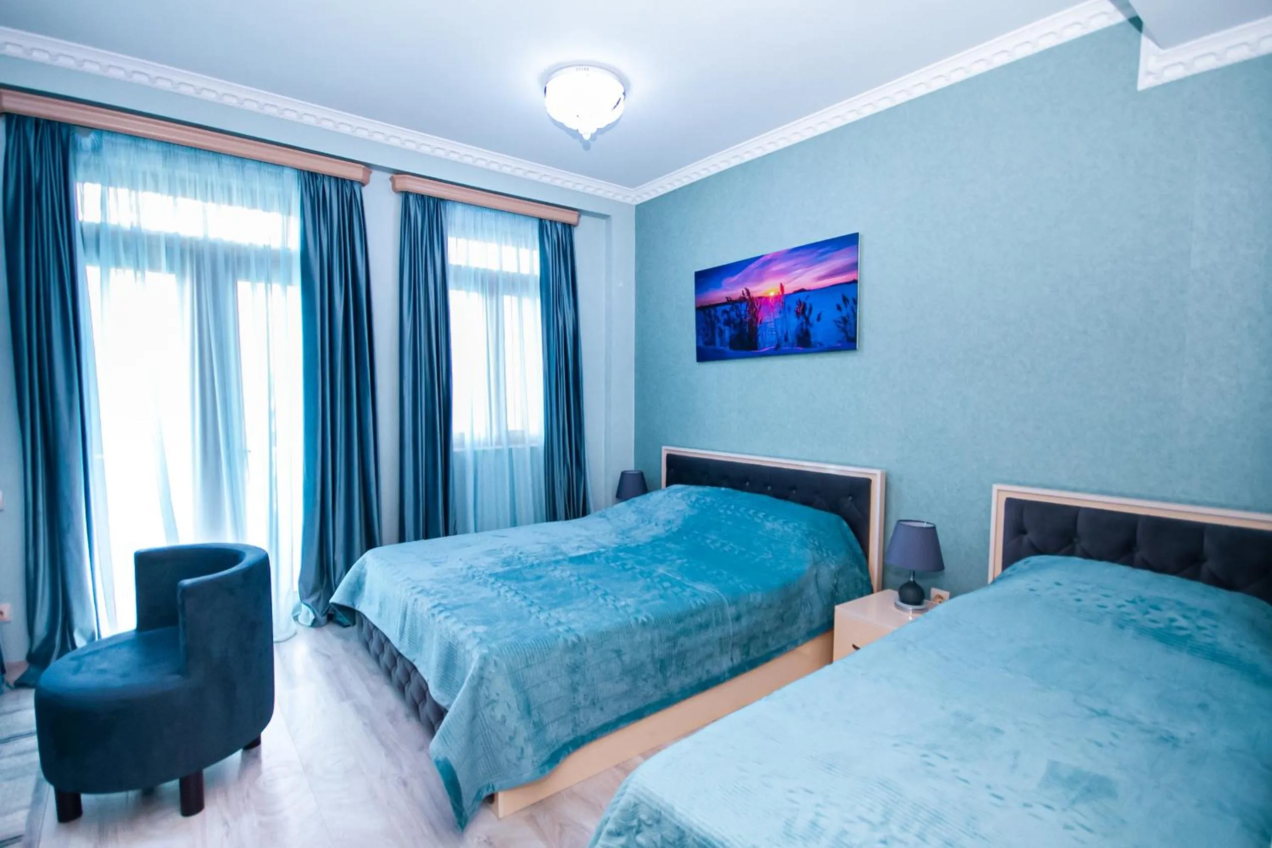 Bed in MUSMORE Boutique Hotel