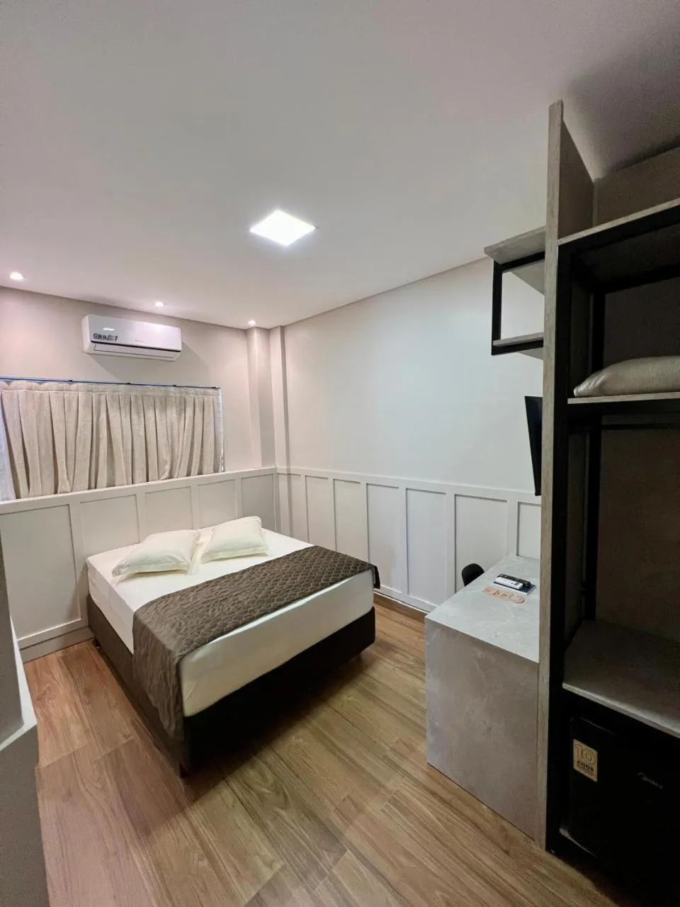 Bed in Arca's Executive Hotel