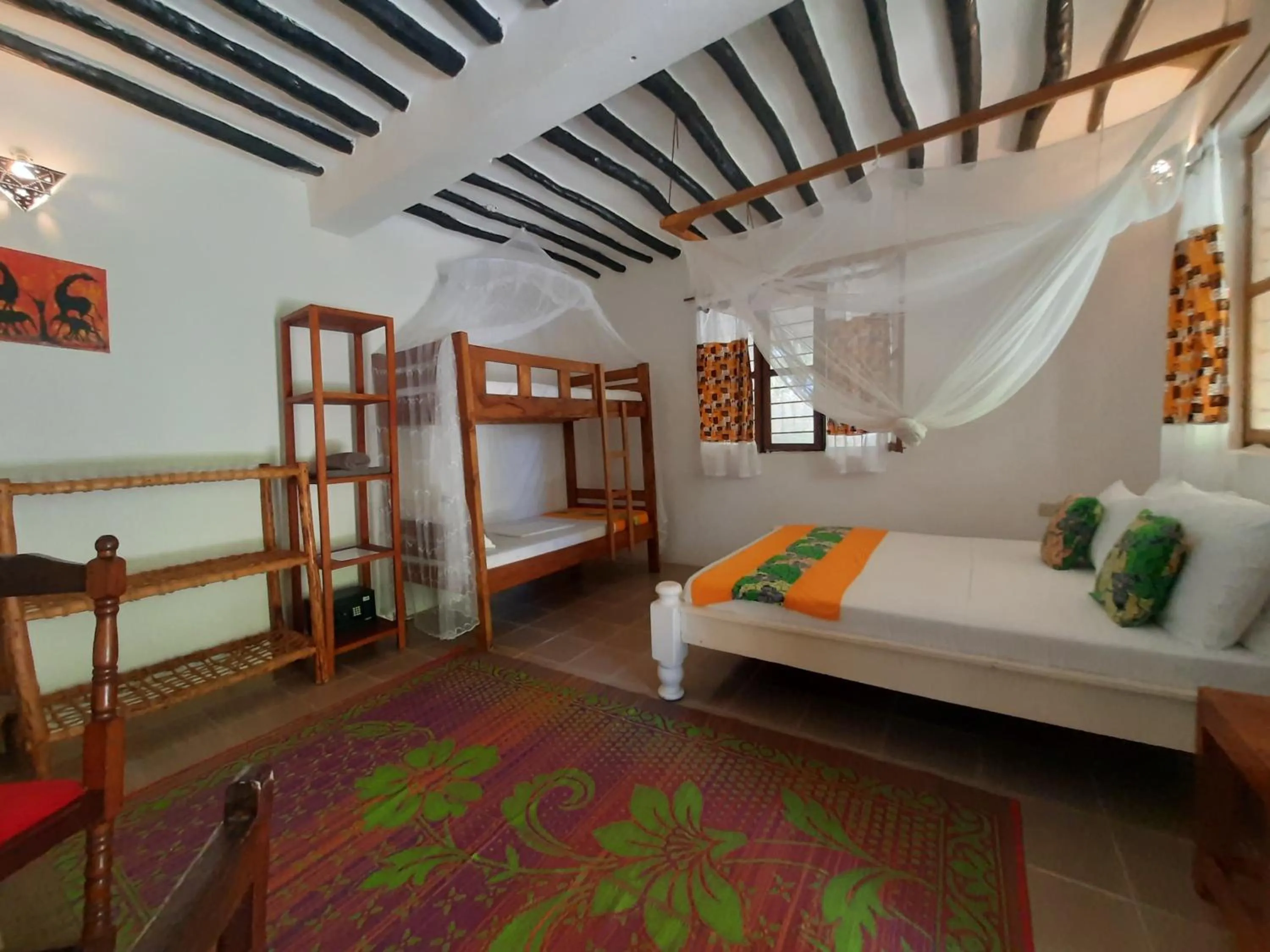 Photo of the whole room, Bed in Zanzibar Gem Beach Bungalows