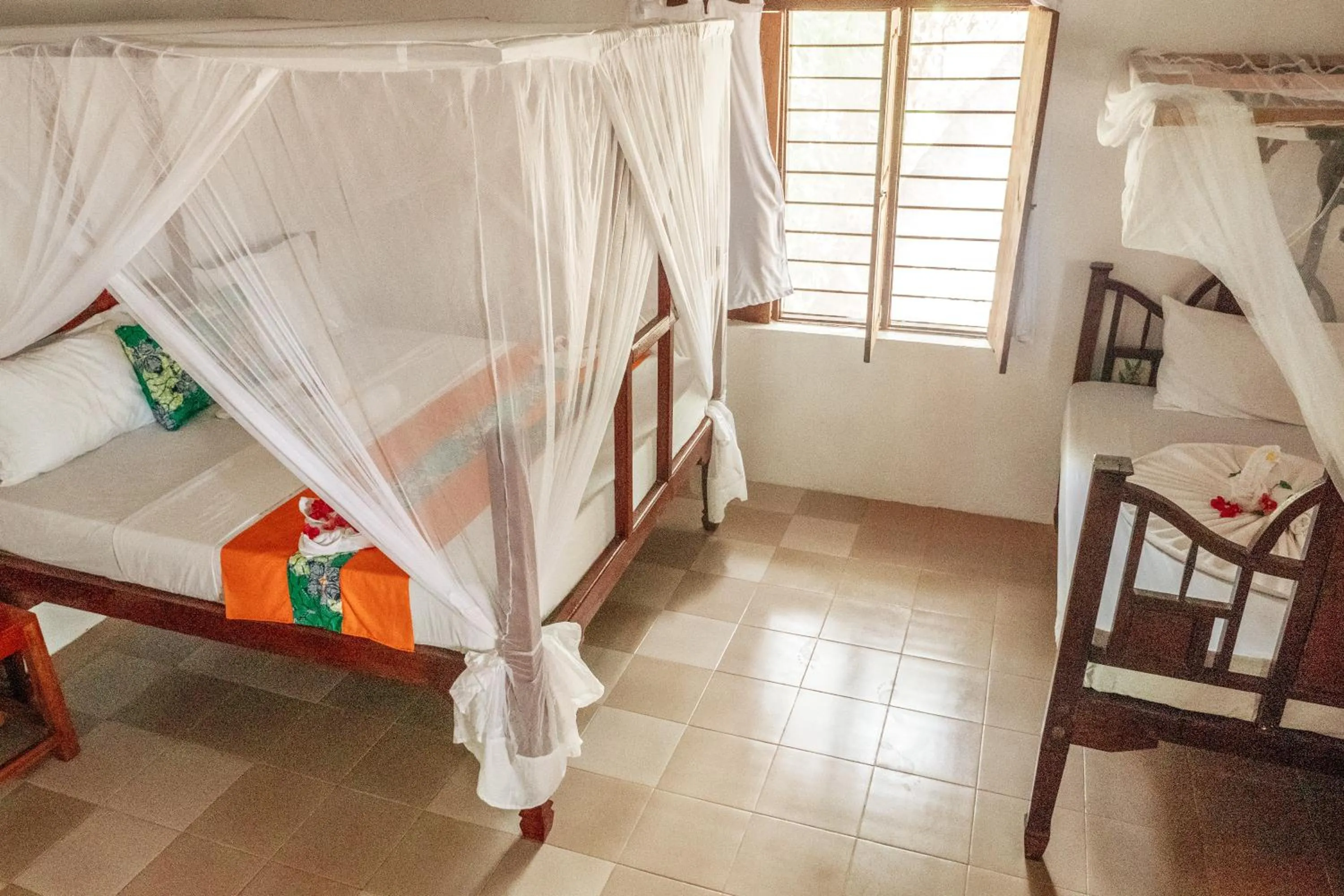 Photo of the whole room, Bed in Zanzibar Gem Beach Bungalows