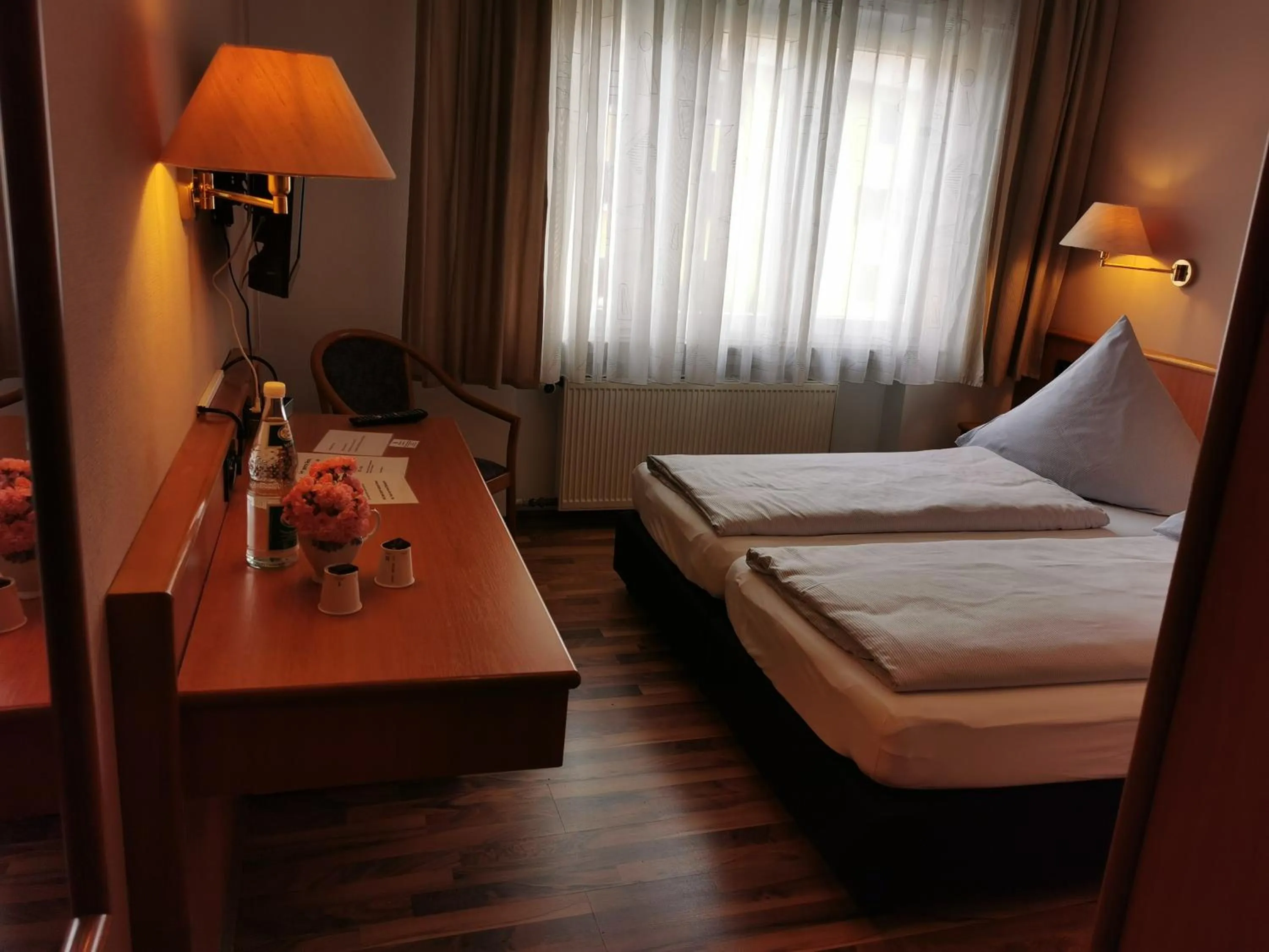 Photo of the whole room, Bed in Hotel Mainperle