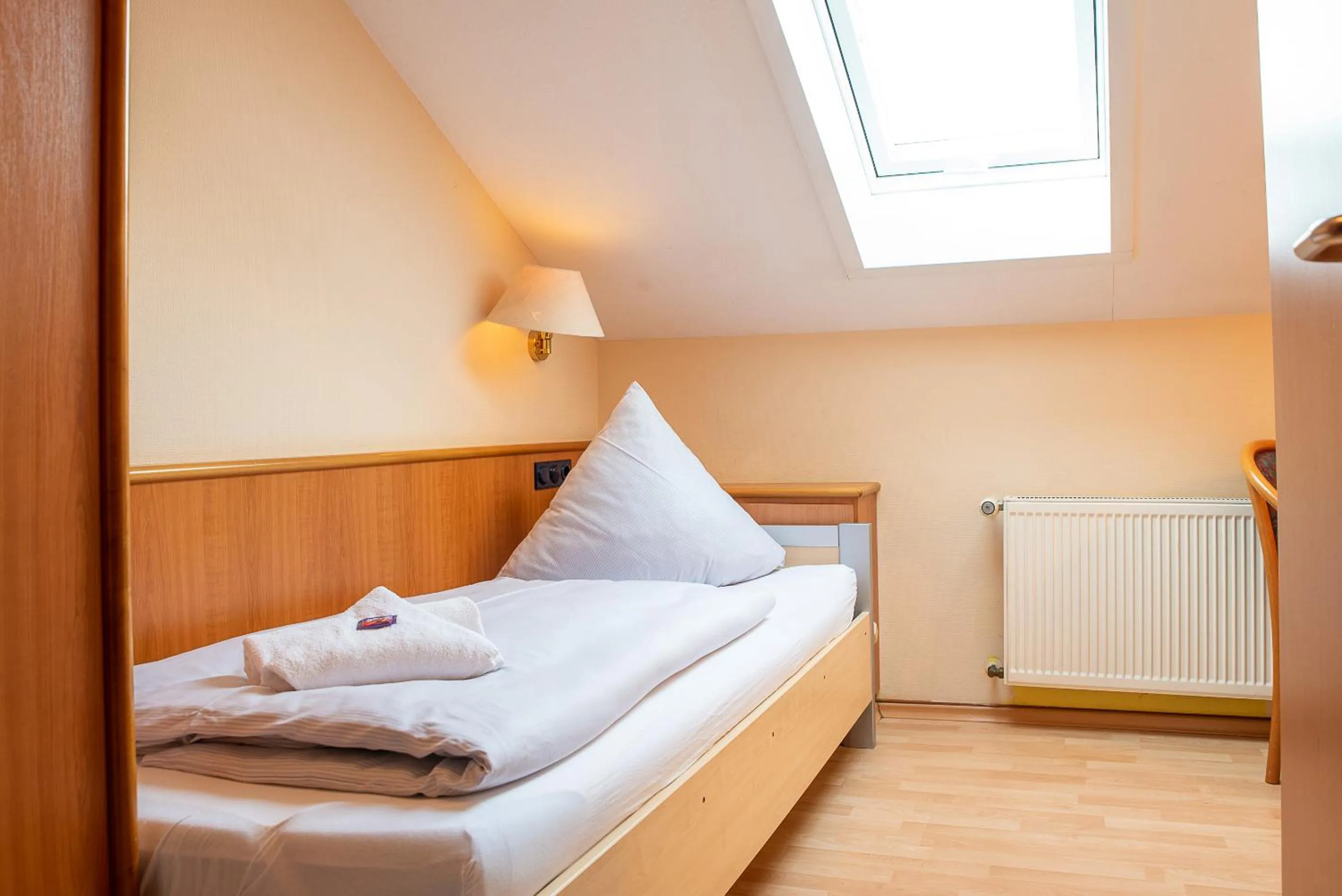 Bed in Hotel Mainperle