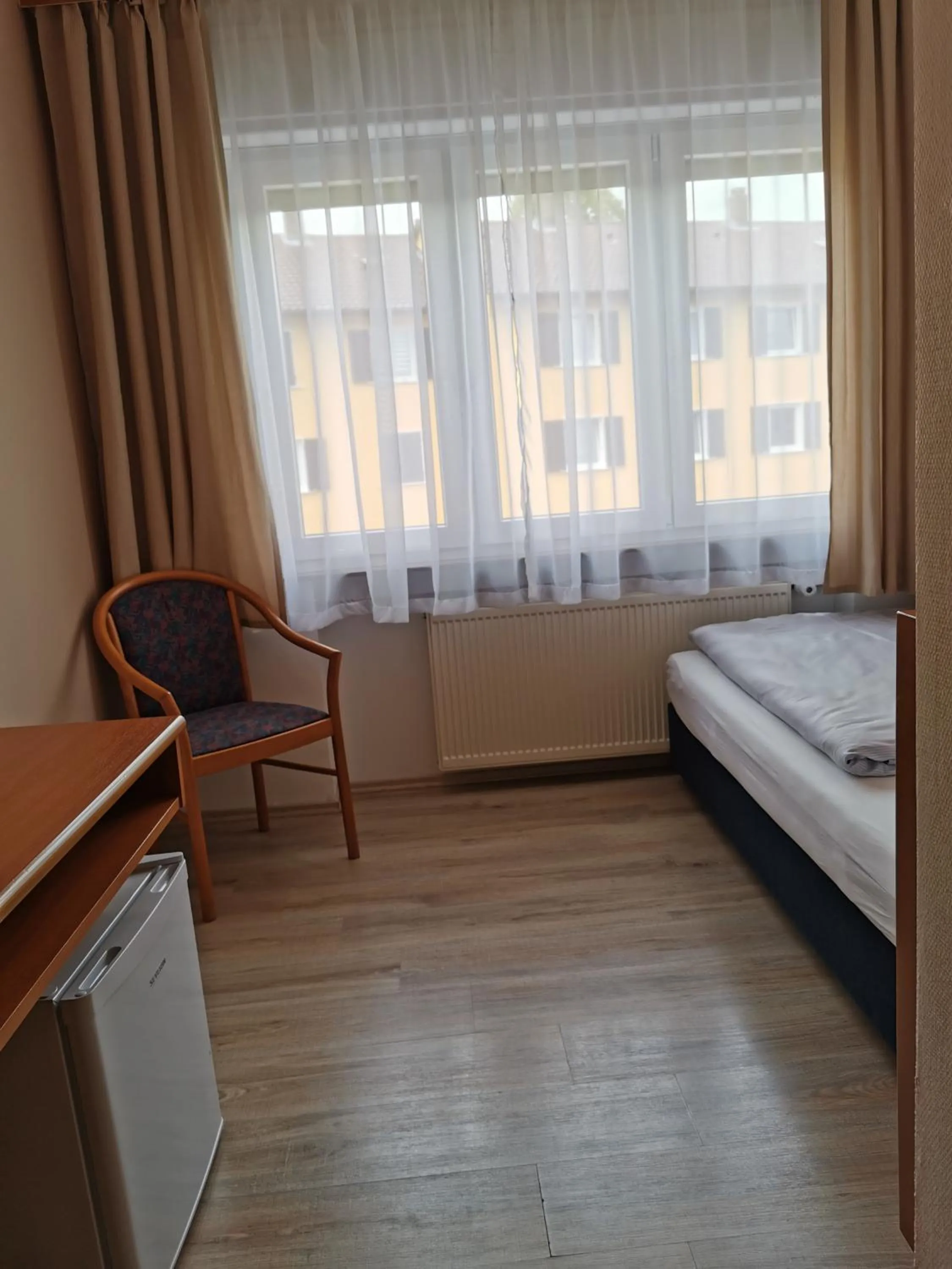 Photo of the whole room, Bed in Hotel Mainperle