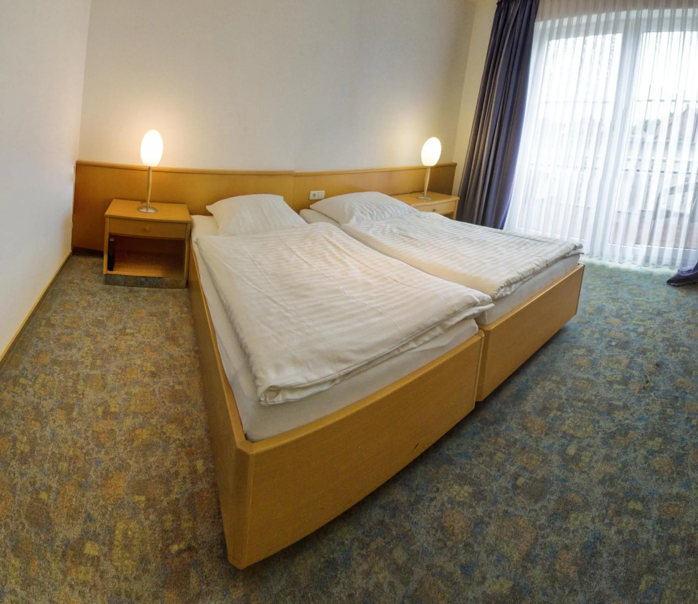 Photo of the whole room, Bed in Landgasthaus Fischer