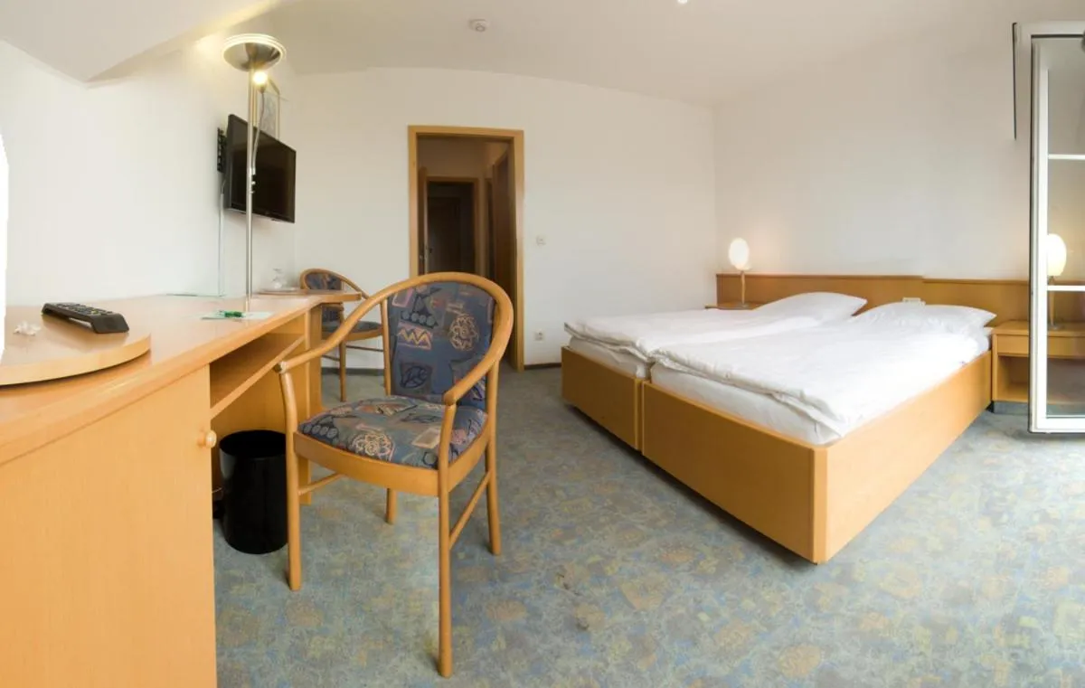 Photo of the whole room, Bed in Landgasthaus Fischer