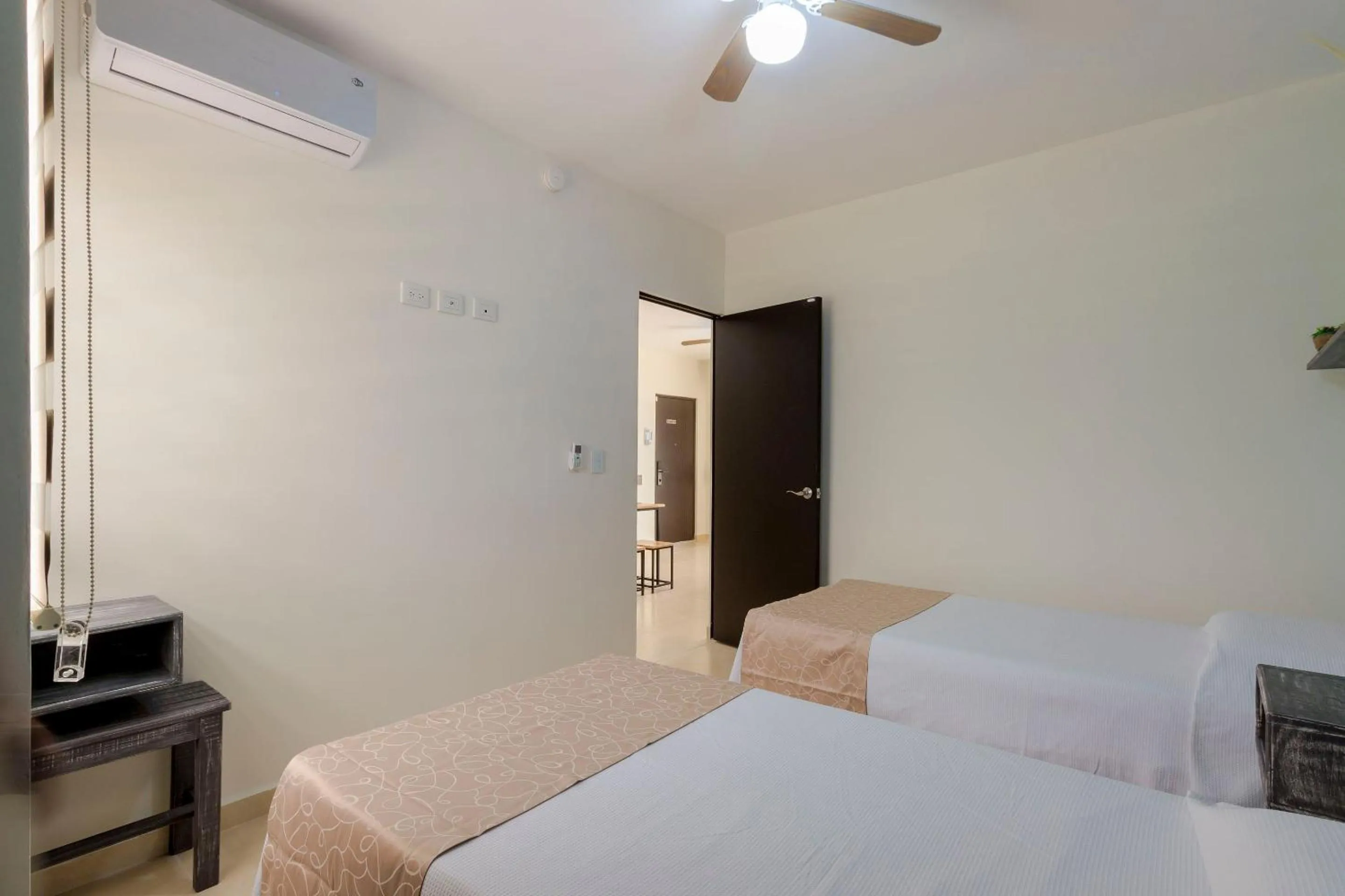 Bed in Breezy & Bright Full Apartment