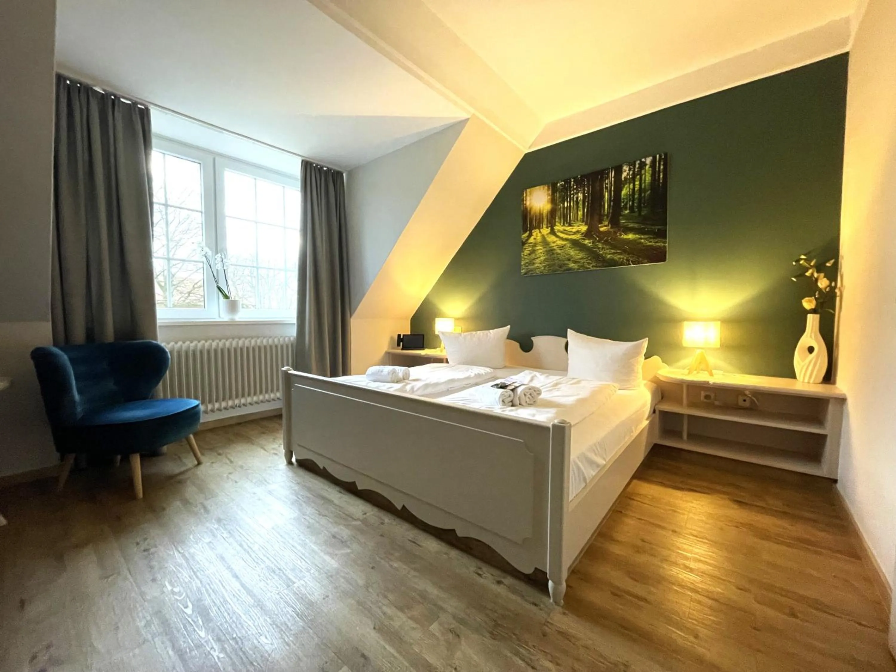 Photo of the whole room, Bed in Landhotel Gutshof im Oertzetal in Oldendorf, Südheide