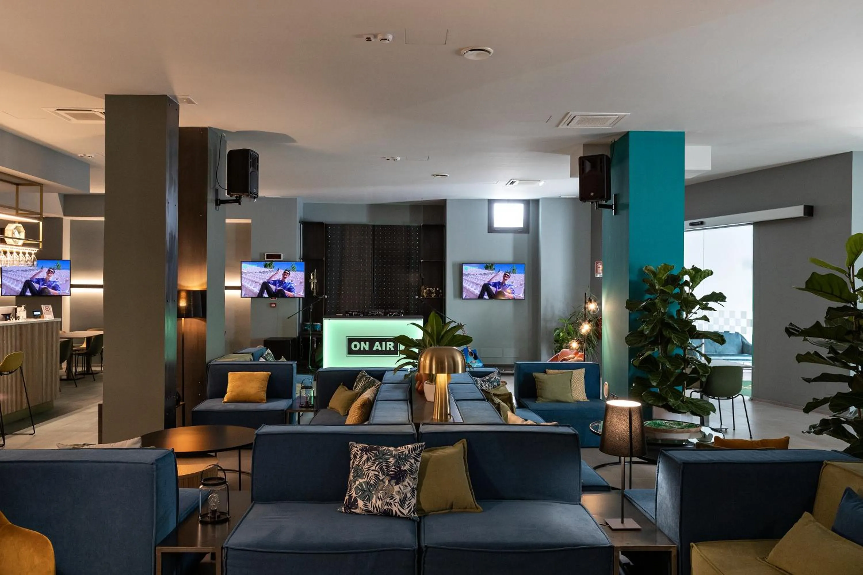 Communal lounge/ TV room in Arryvo Hotel