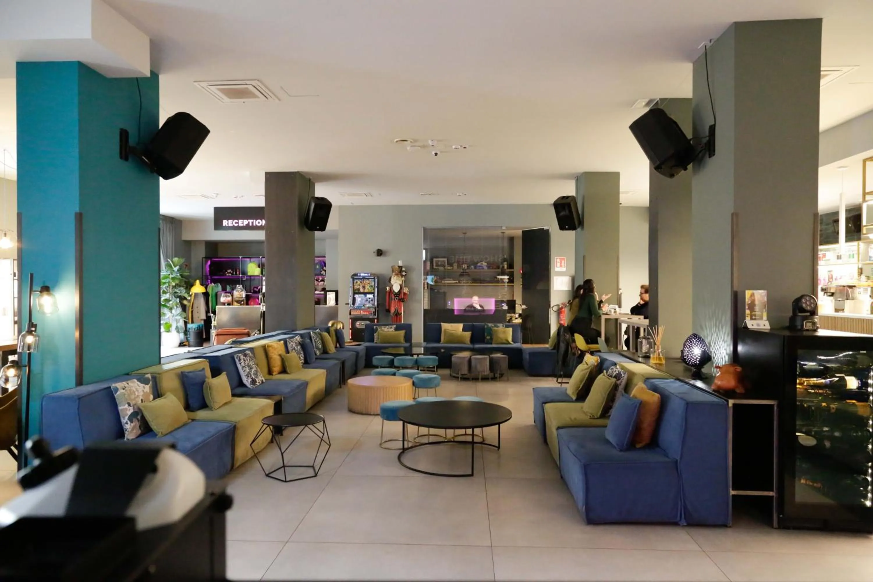 Communal lounge/ TV room in Arryvo Hotel