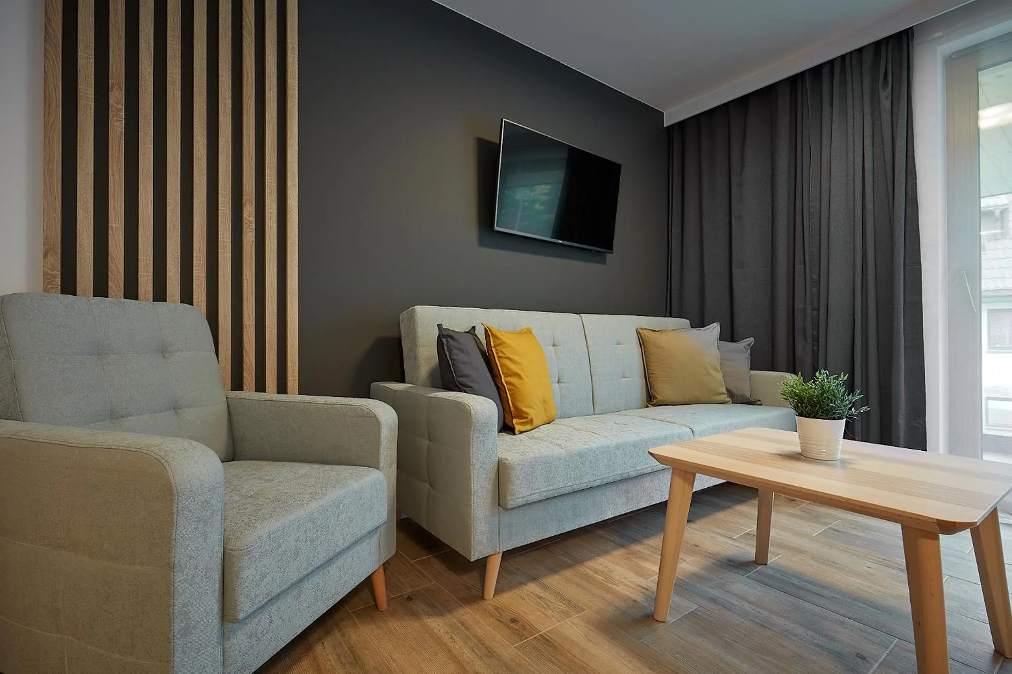 Communal lounge/ TV room in Tatra Square Apartments