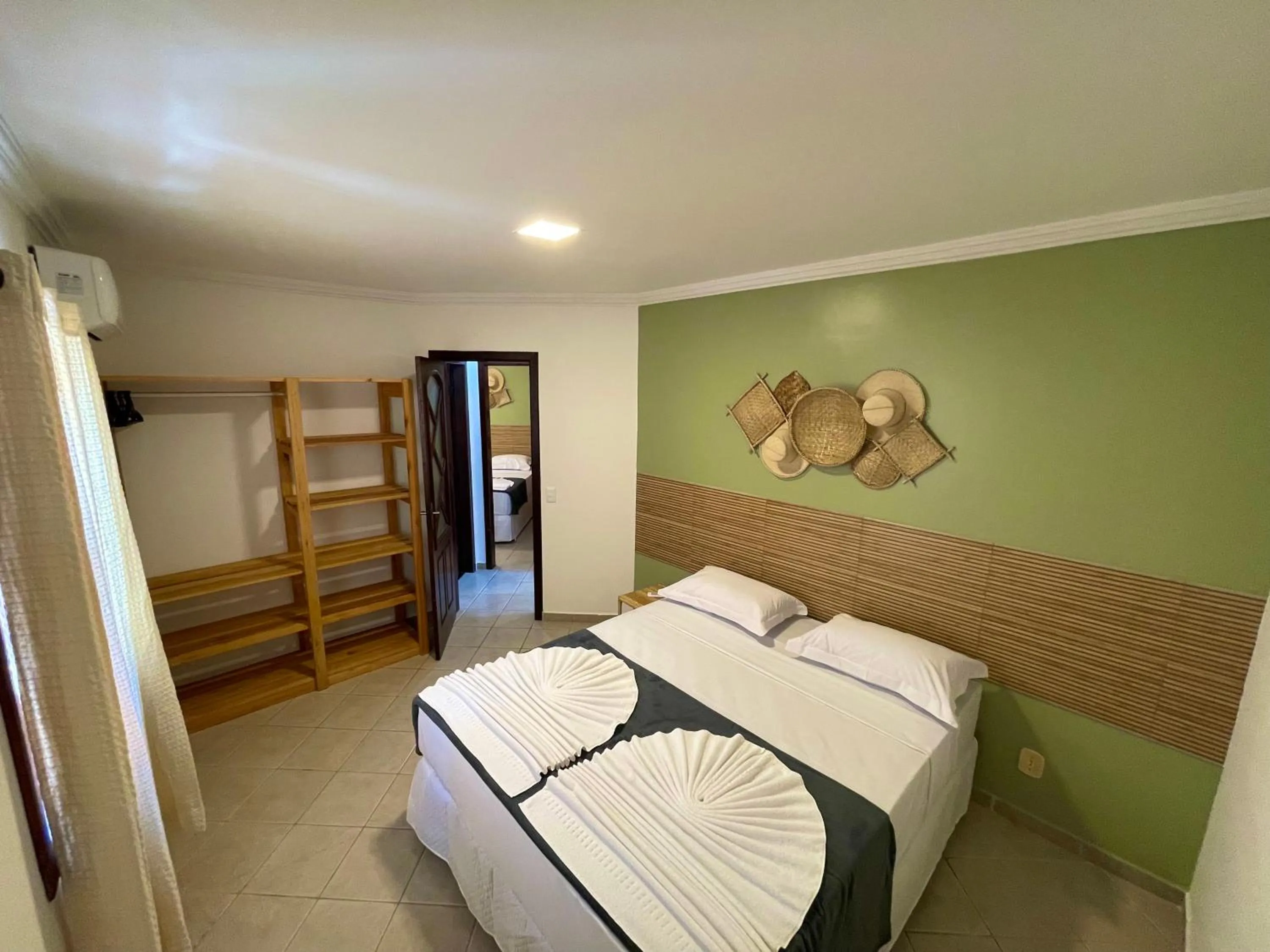 Bed in MUTA PRAIA HOTEL