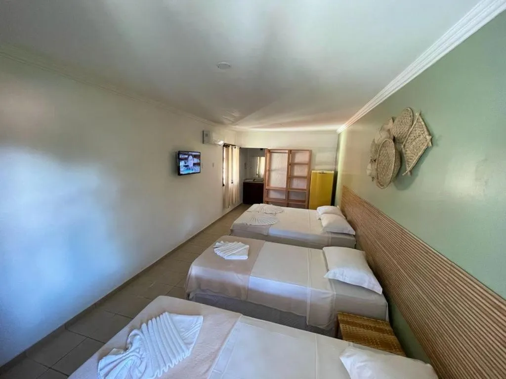 Bed in MUTA PRAIA HOTEL