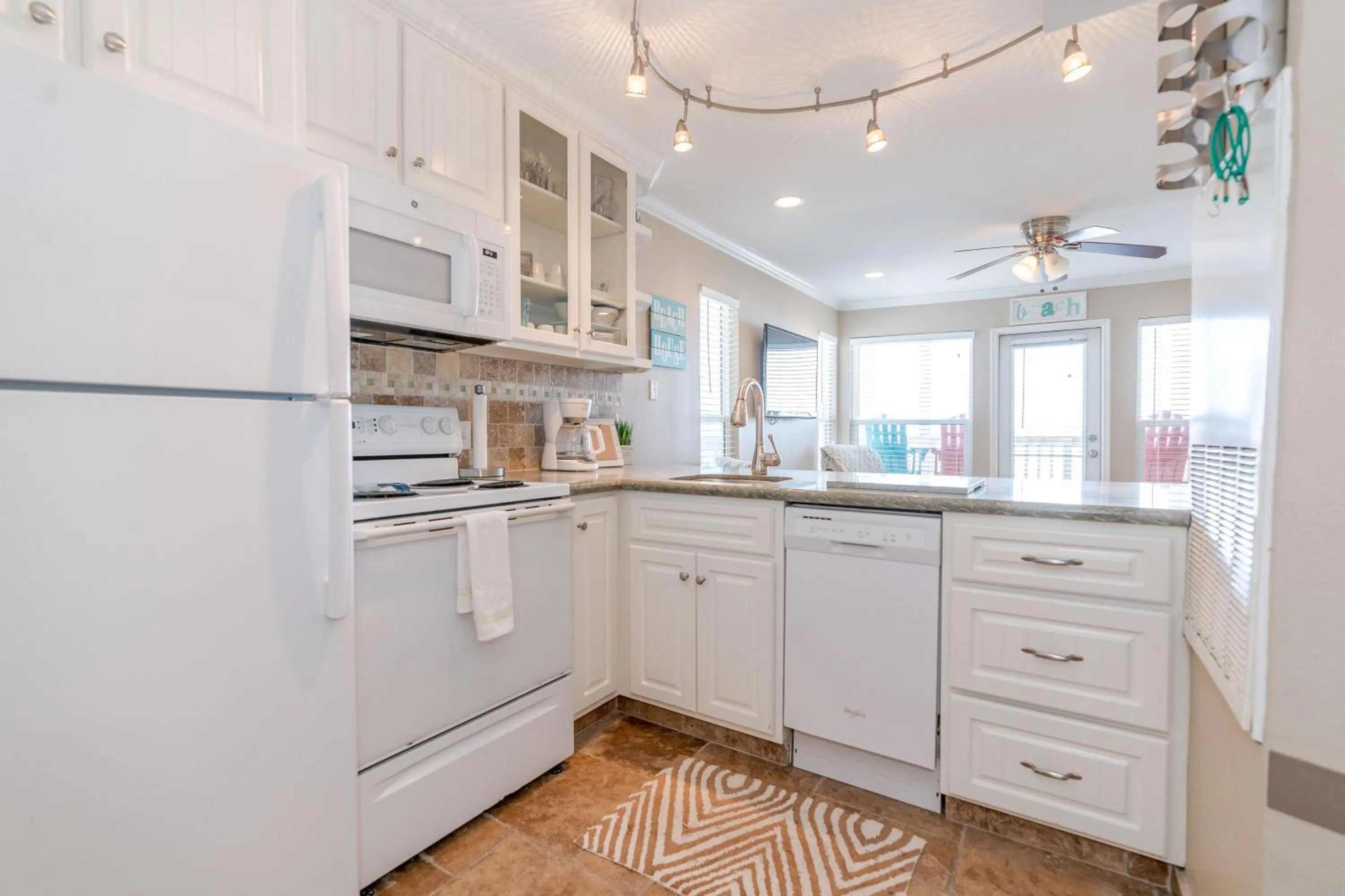 kitchen in Steps to Pool and BeachAmazing Views from Two Balconies