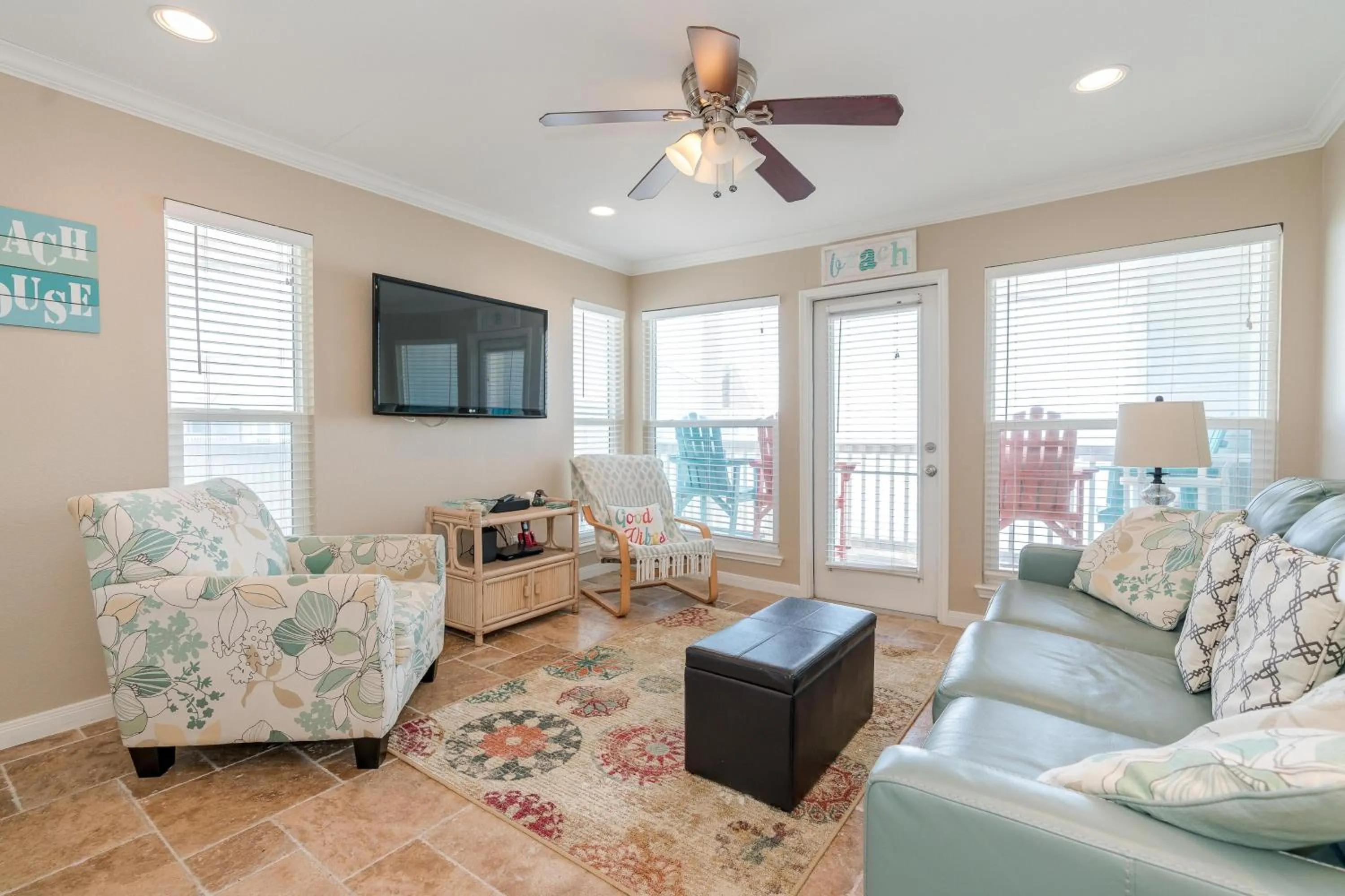 Living room in Steps to Pool and BeachAmazing Views from Two Balconies