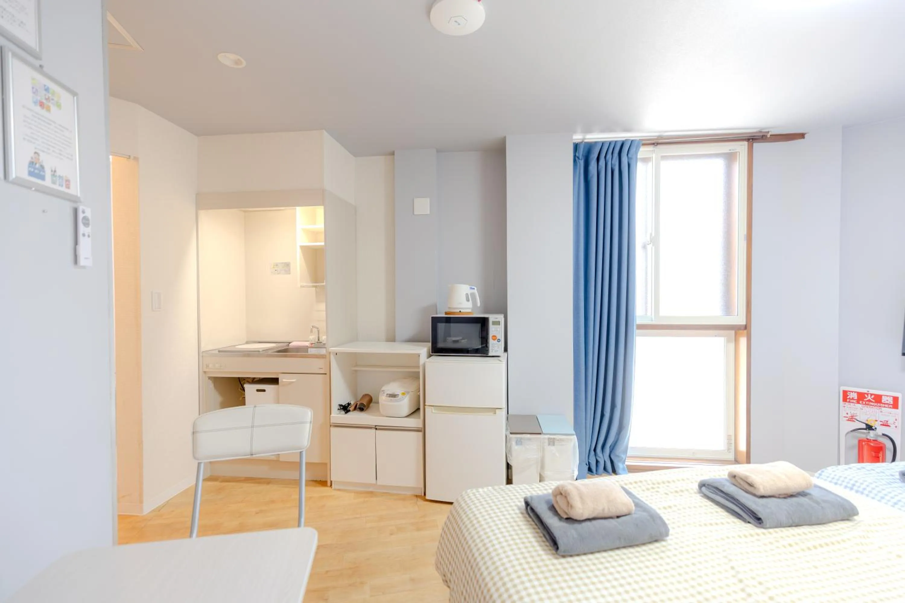 Bed in 武蔵Musashi Hotel