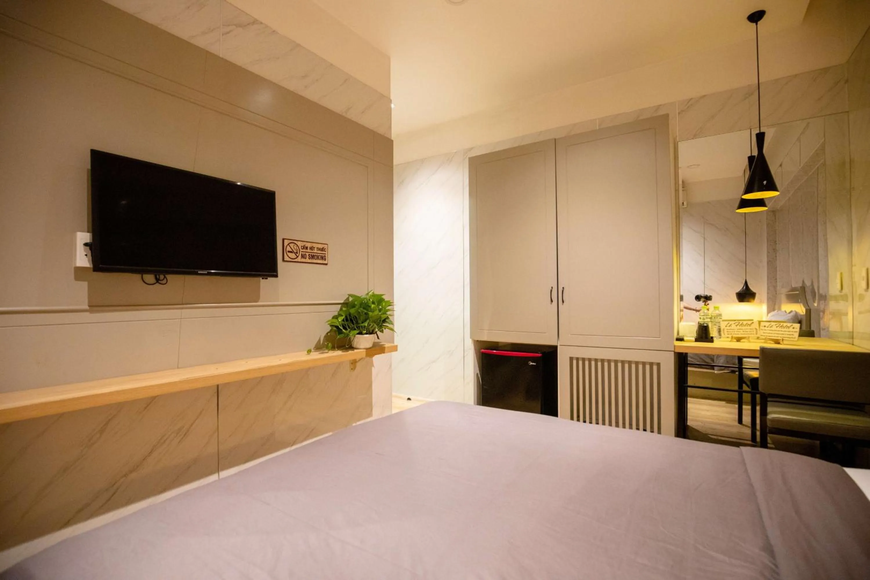 Bed in Lá Hotel Q10