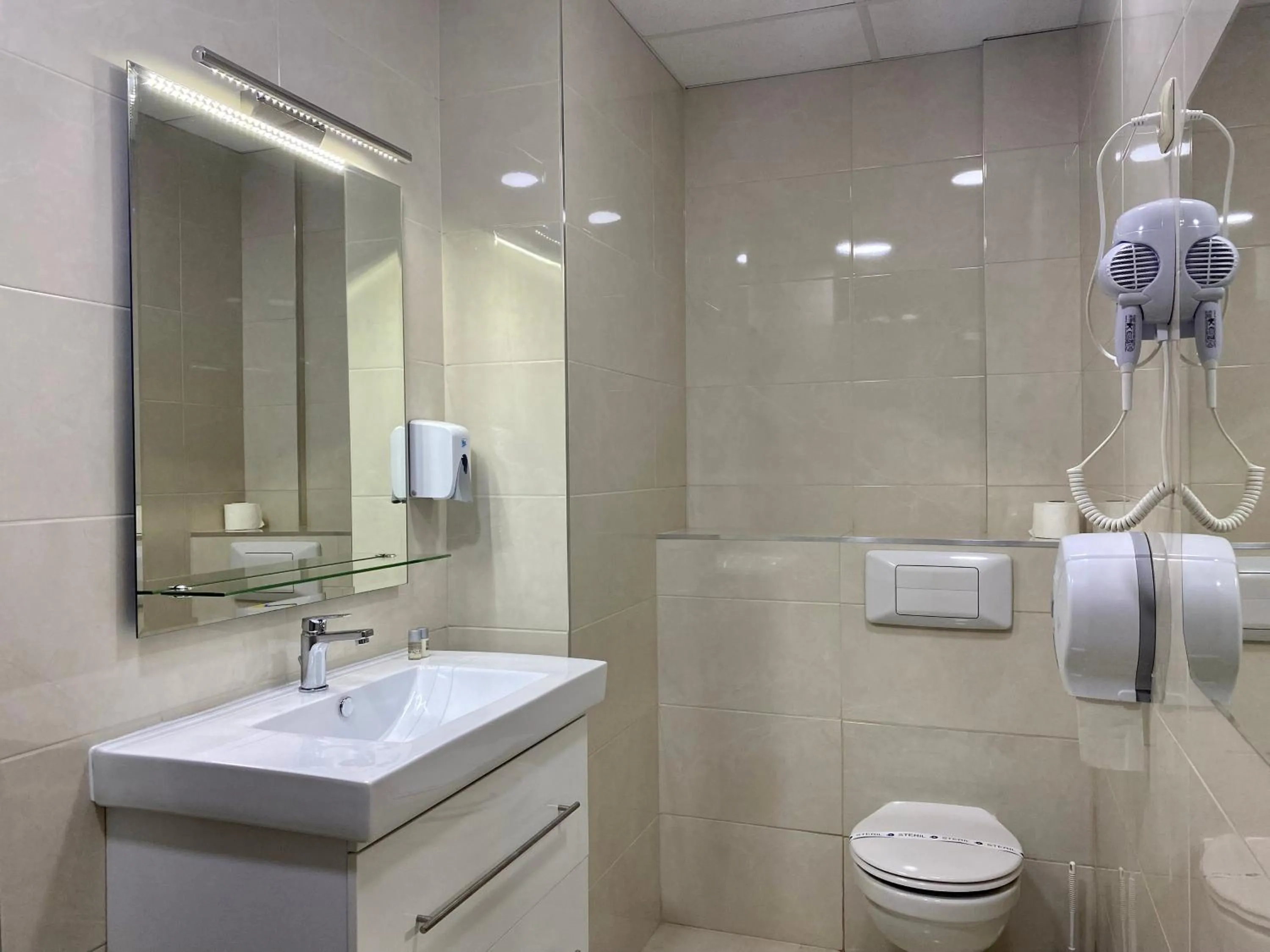 Bathroom in OPERA16 Guestrooms